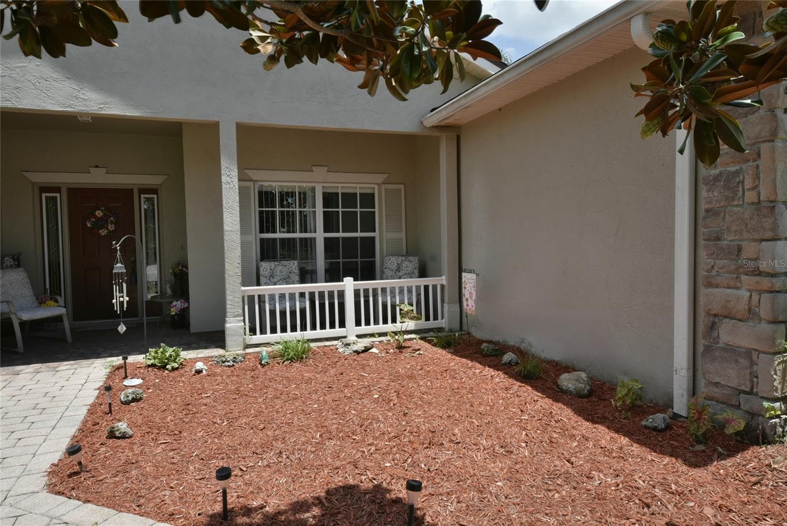 The fresh landscaping at the front entry. - 4360 ASHTON CLUB DR, LAKE WALES