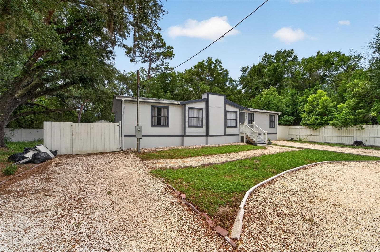 Manufactured Home at 9690 JEROME DR, NEW PORT RICHEY, photo 3 of 59