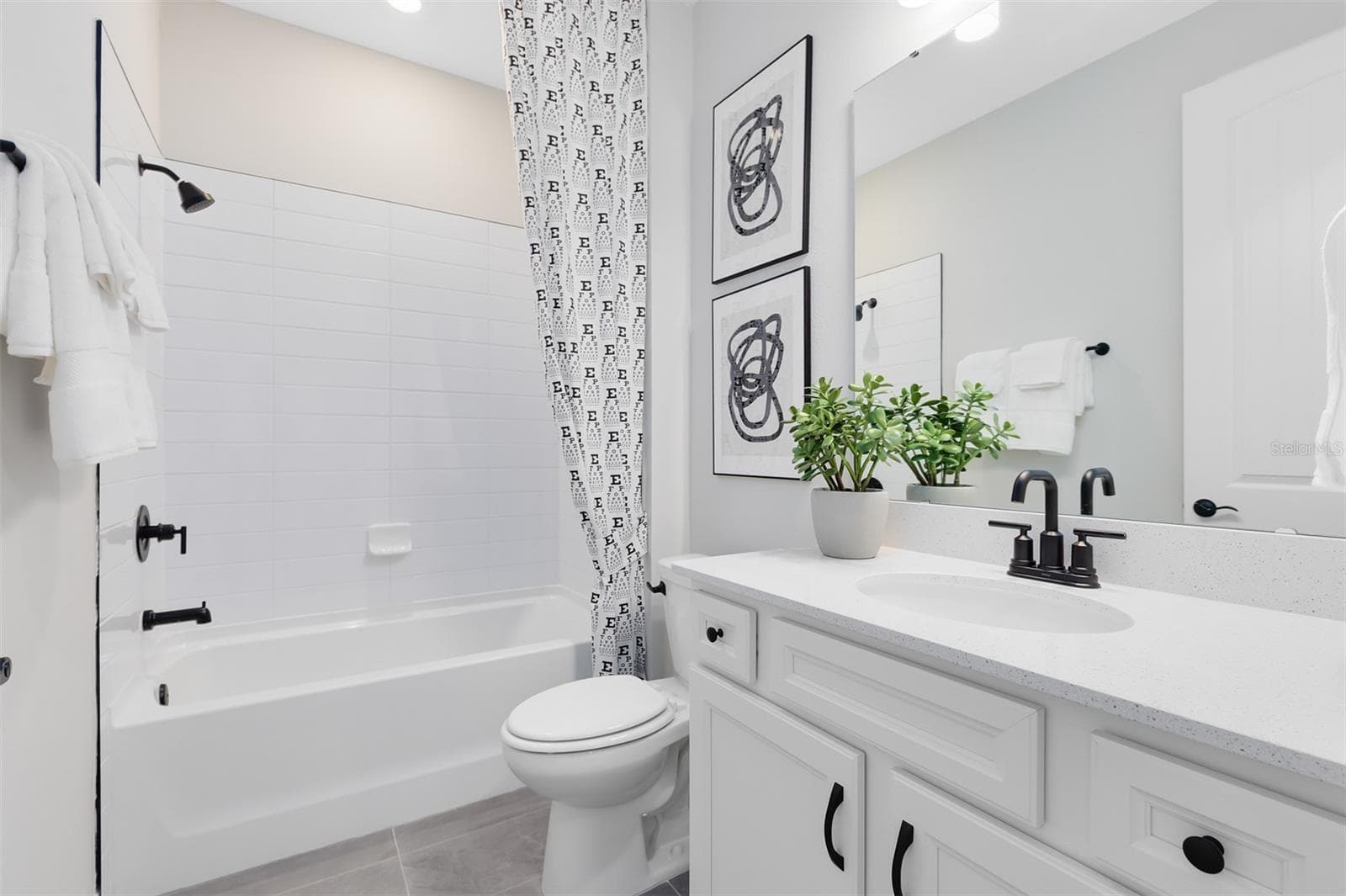 Model Home Design Only. Pictures and furnishings are for illustrative purposes only. Elevations, colors and options may vary. Furniture is for model home staging only. - 5679 FLAME VINE WAY, ST CLOUD