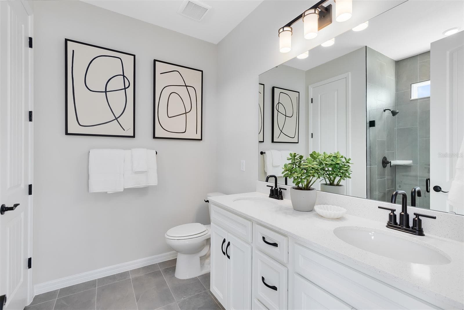 Model Home Design Only. Pictures and furnishings are for illustrative purposes only. Elevations, colors and options may vary. Furniture is for model home staging only. - 5679 FLAME VINE WAY, ST CLOUD
