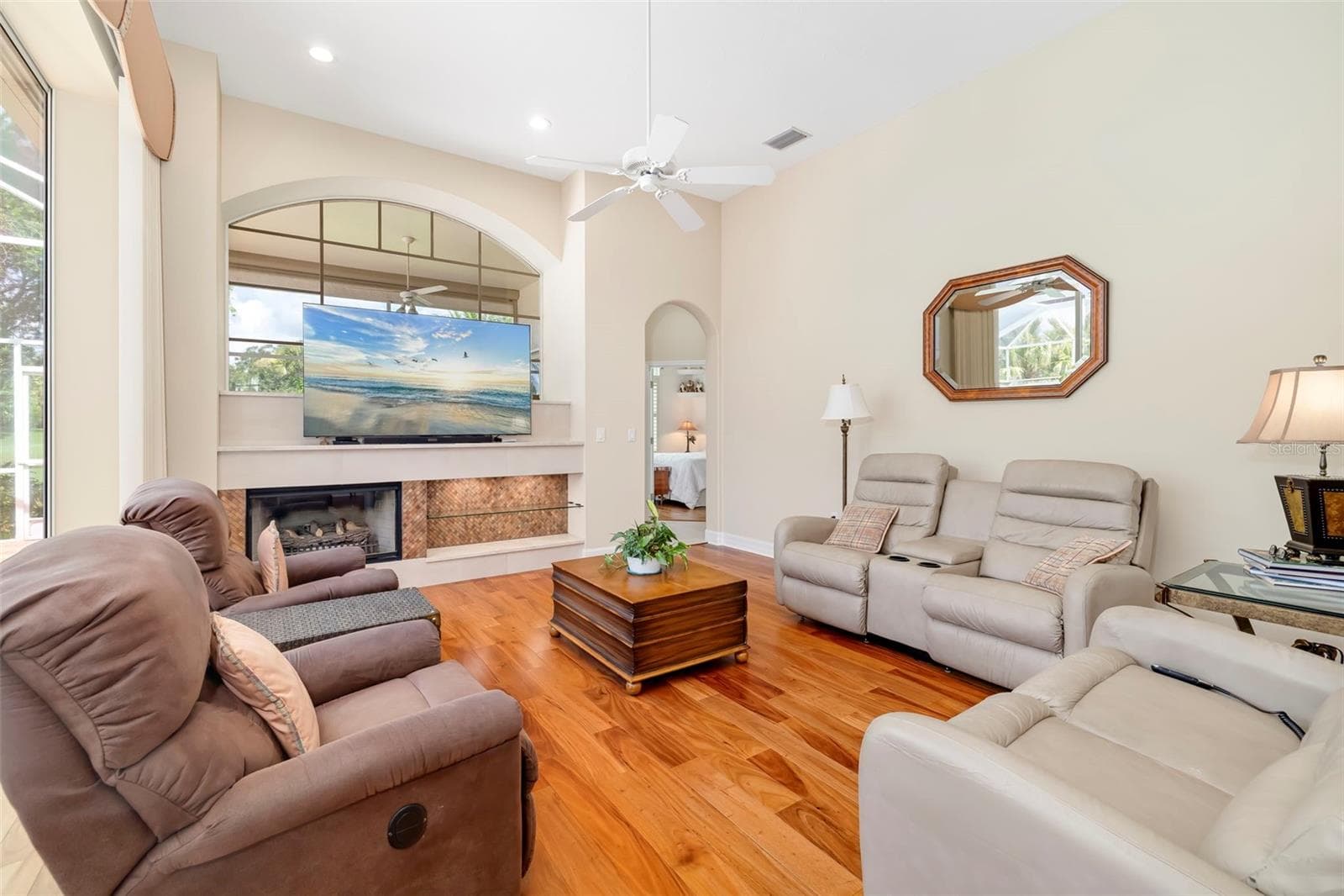 Gathering room with fireplace - 2528 TOM MORRIS DR, SARASOTA