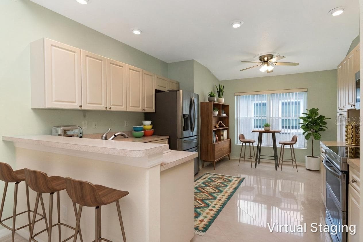 Eat-In Kitchen Virtually Staged - 10029 BROOKDALE DR, NEW PORT RICHEY