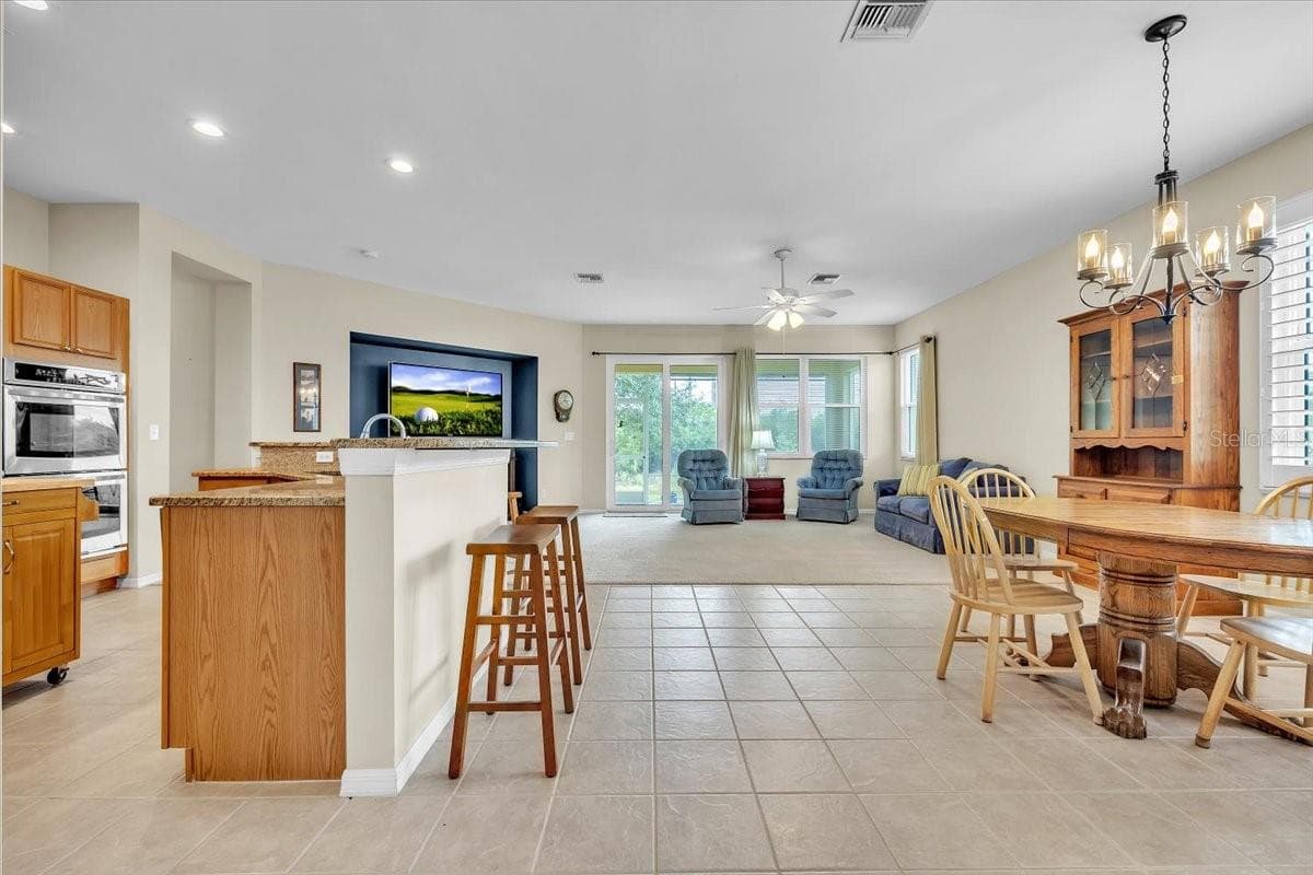 Single Family Residence at 12933 SW PEMBROKE CIR S, LAKE SUZY, photo 9 of 47