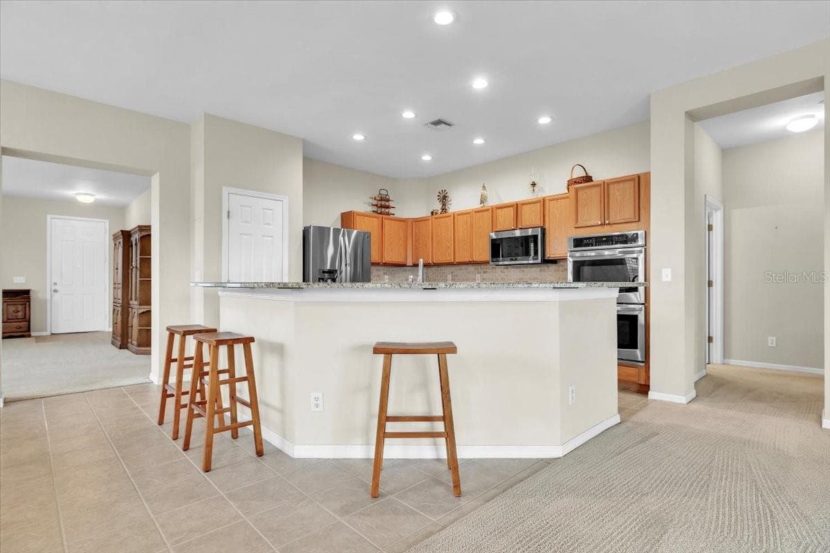 Single Family Residence at 12933 SW PEMBROKE CIR S, LAKE SUZY, photo 11 of 47