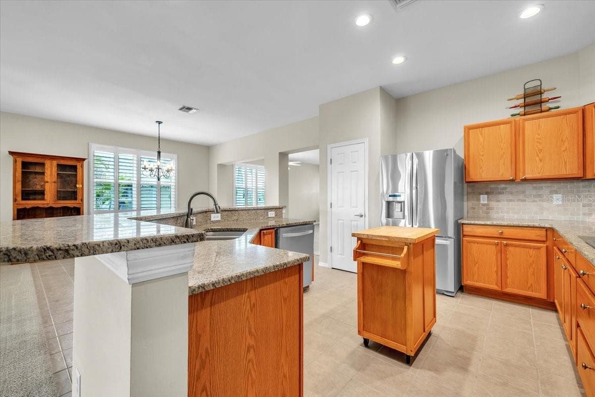 Single Family Residence at 12933 SW PEMBROKE CIR S, LAKE SUZY, photo 14 of 47