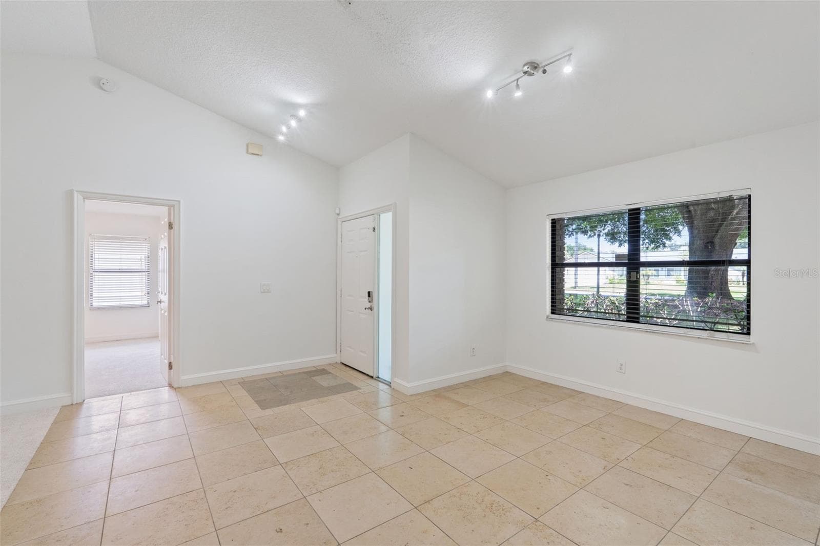 Dining room with view of front yard - 9433 PALM TREE DR, WINDERMERE