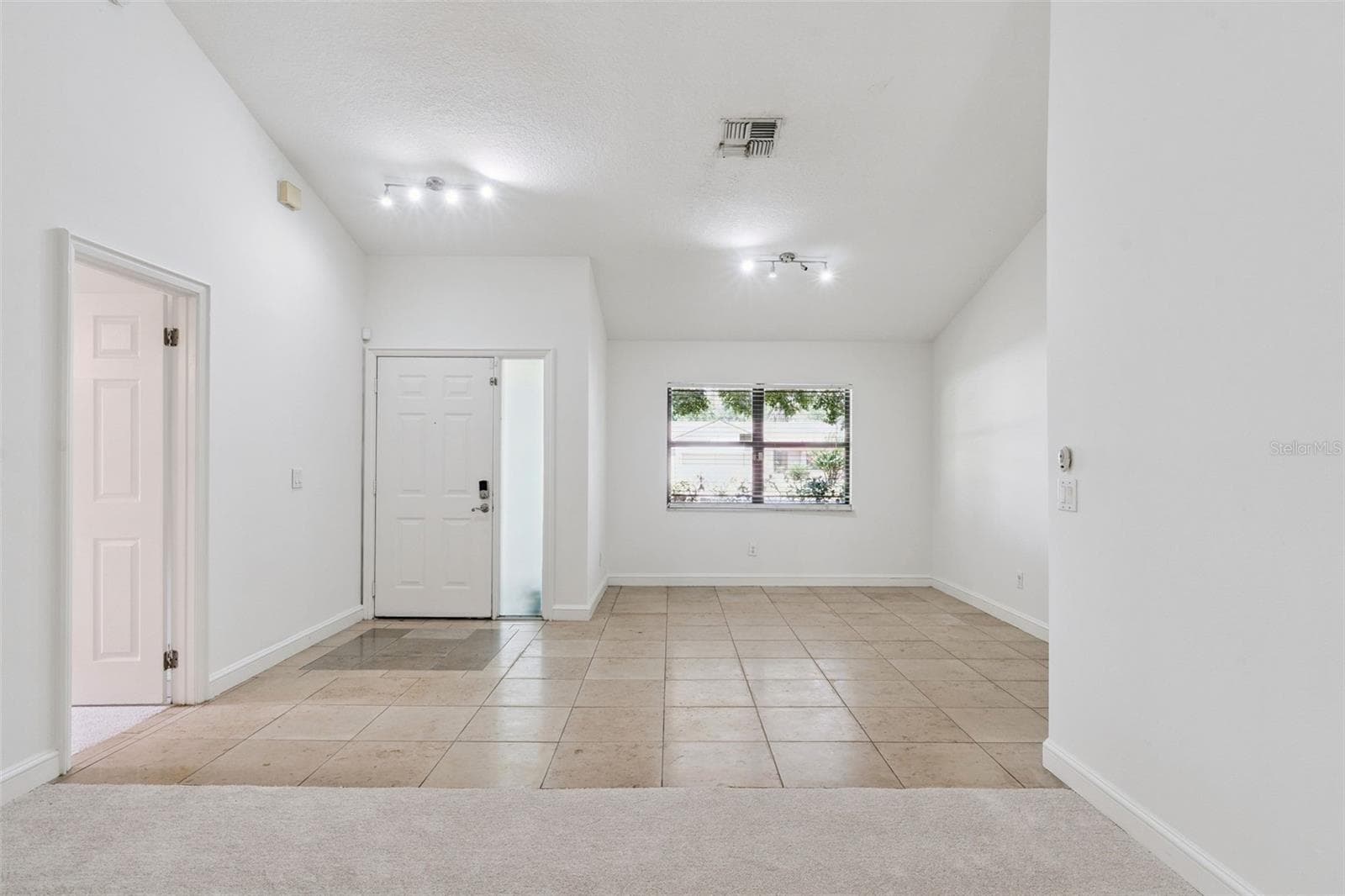 Dining Room and Front Door - 9433 PALM TREE DR, WINDERMERE