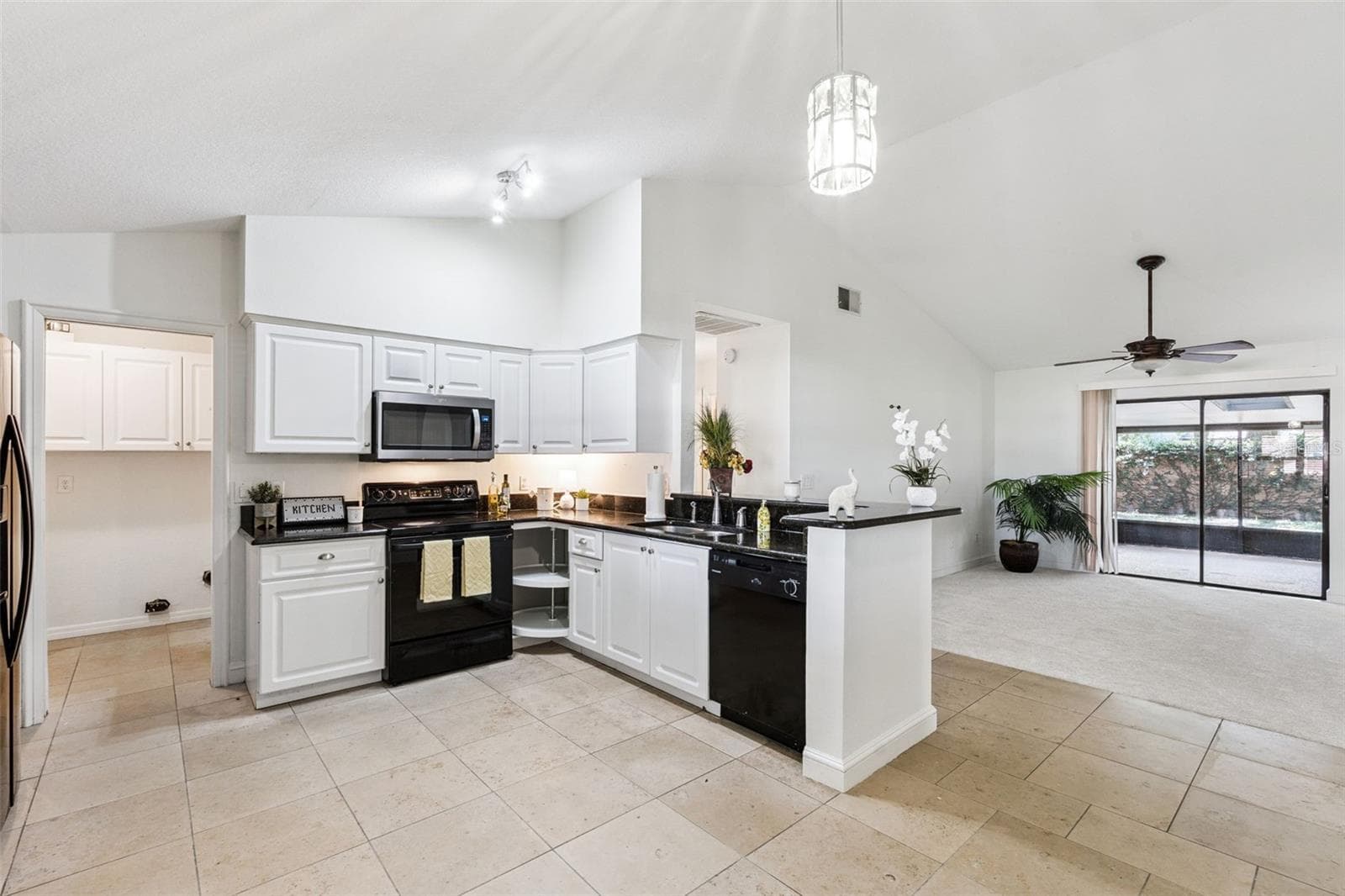 Kitchen open to Family Room - 9433 PALM TREE DR, WINDERMERE