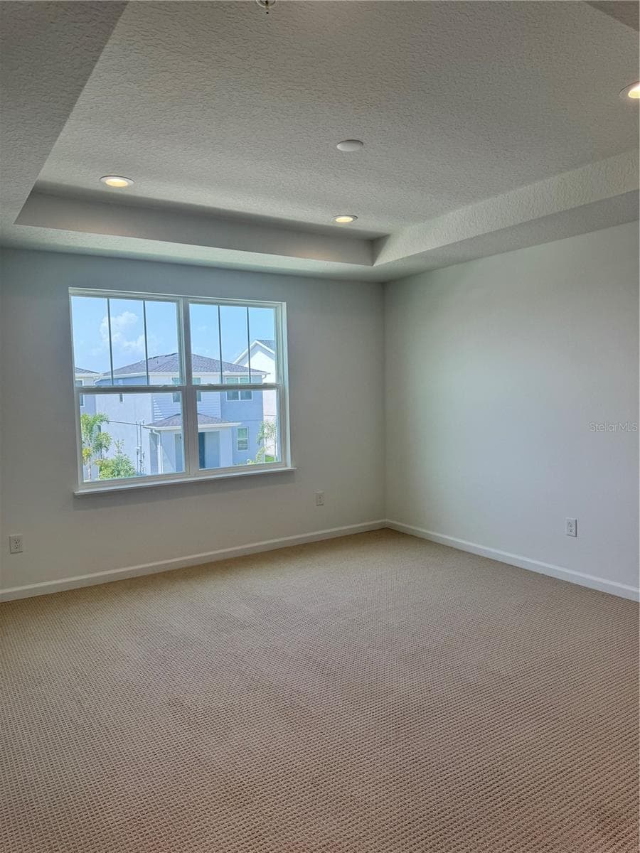 Primary suite with tray ceilings - 1888 CROWNCREST DR, APOPKA