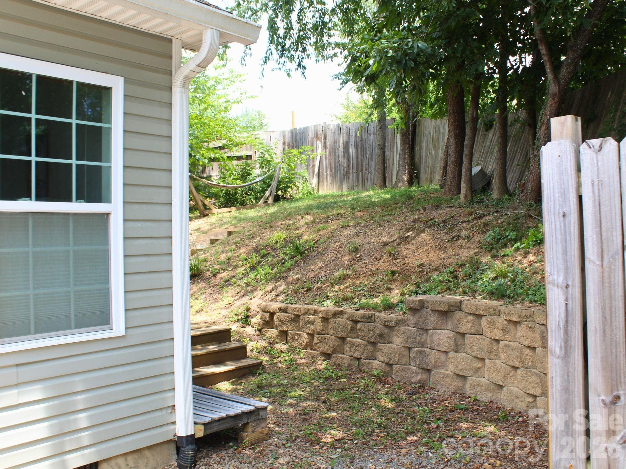 7/9/26 part of fence removed for more parking space - 253 Brooklyn Lane, Asheville