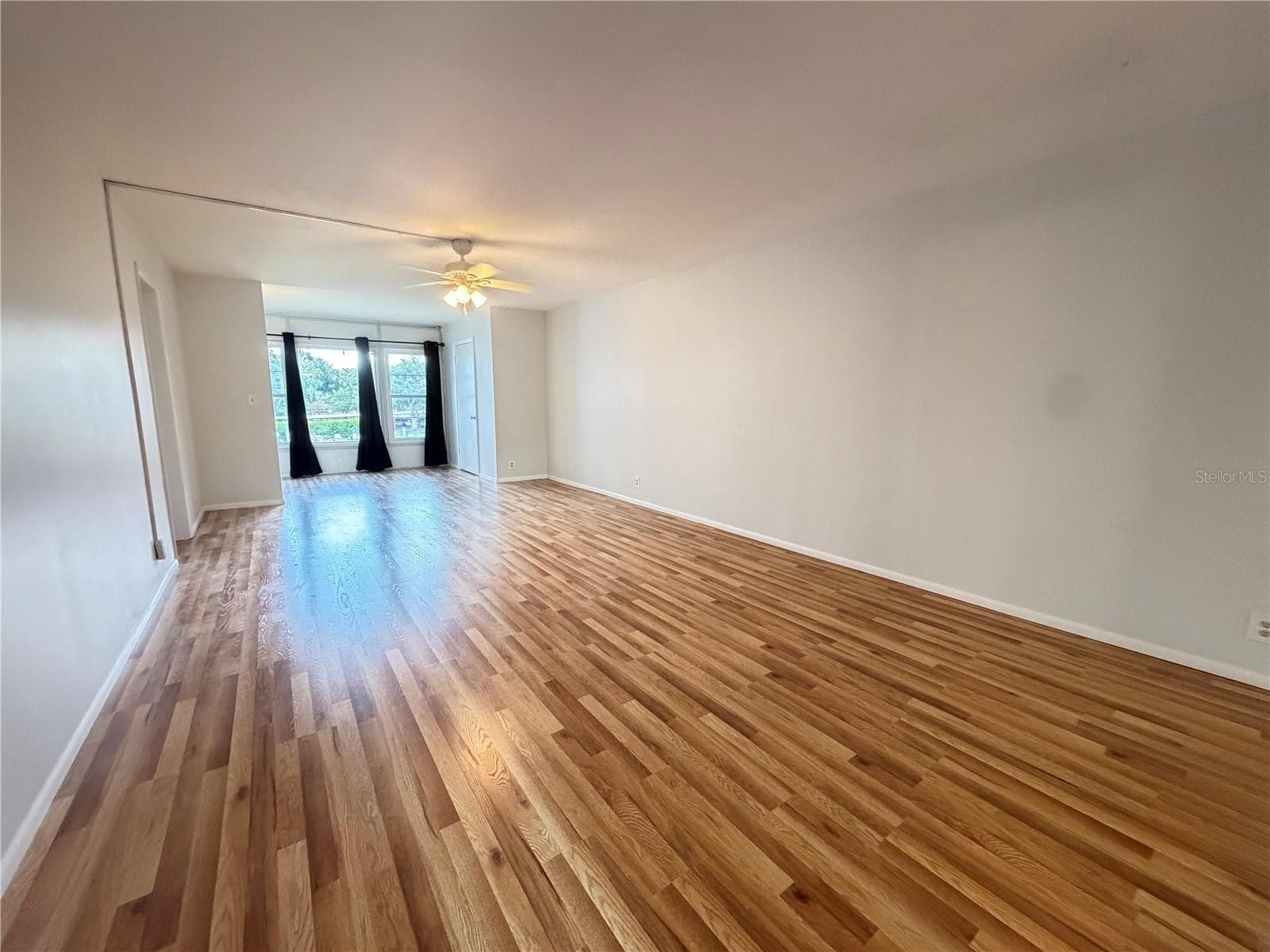living/dining room - 333 LAKE HOWARD DR NW #211B, WINTER HAVEN