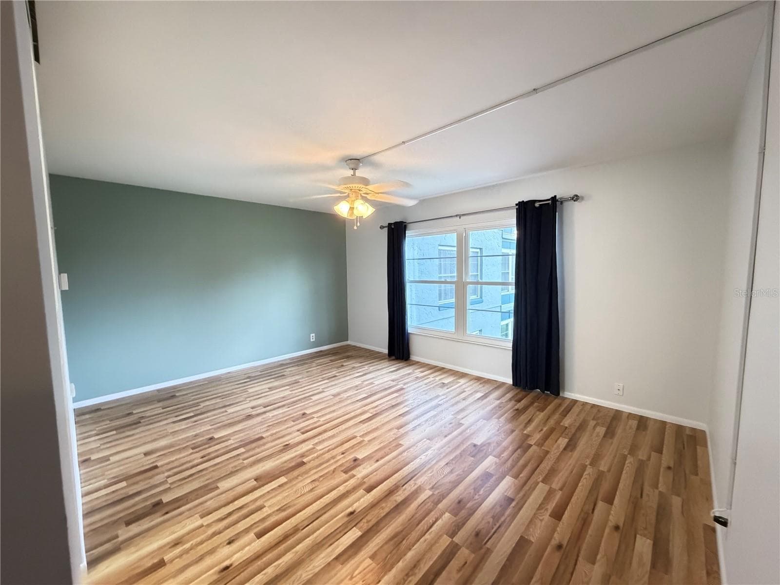 primary bedroom - 333 LAKE HOWARD DR NW #211B, WINTER HAVEN