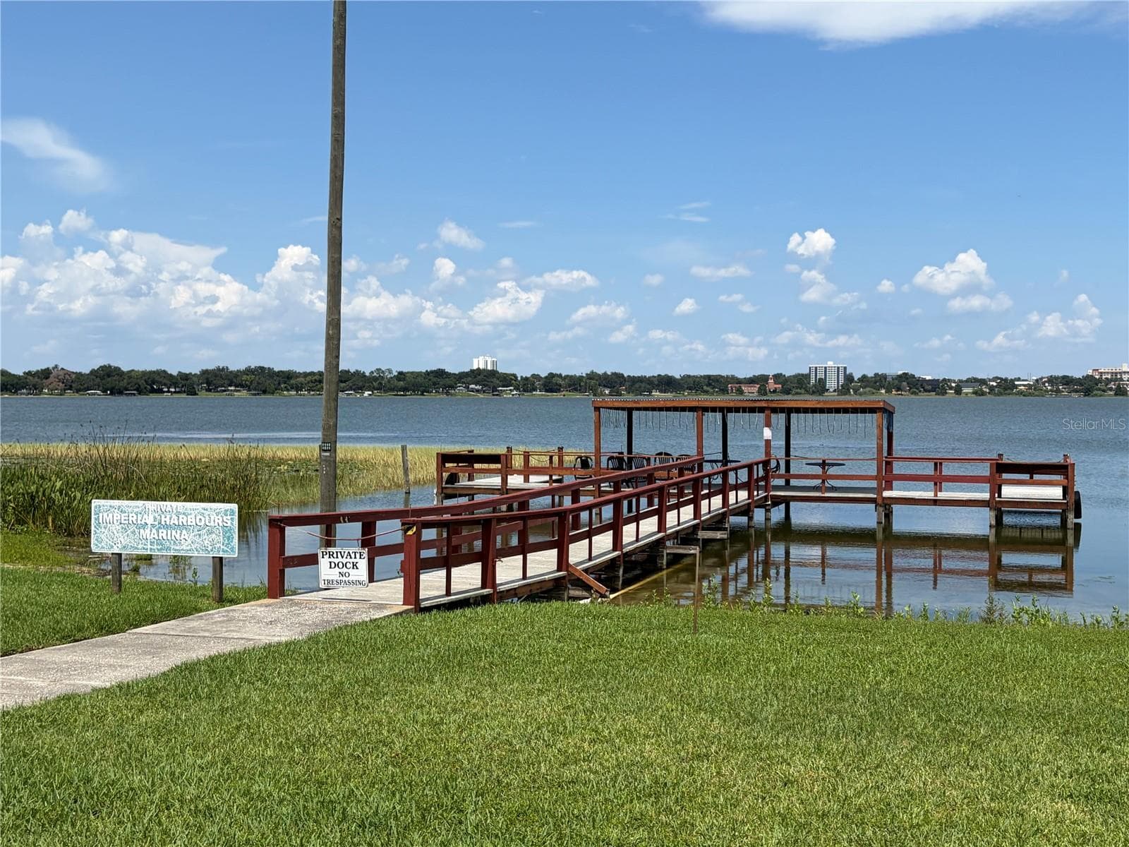 private community dock on Lake Howard - 333 LAKE HOWARD DR NW #211B, WINTER HAVEN