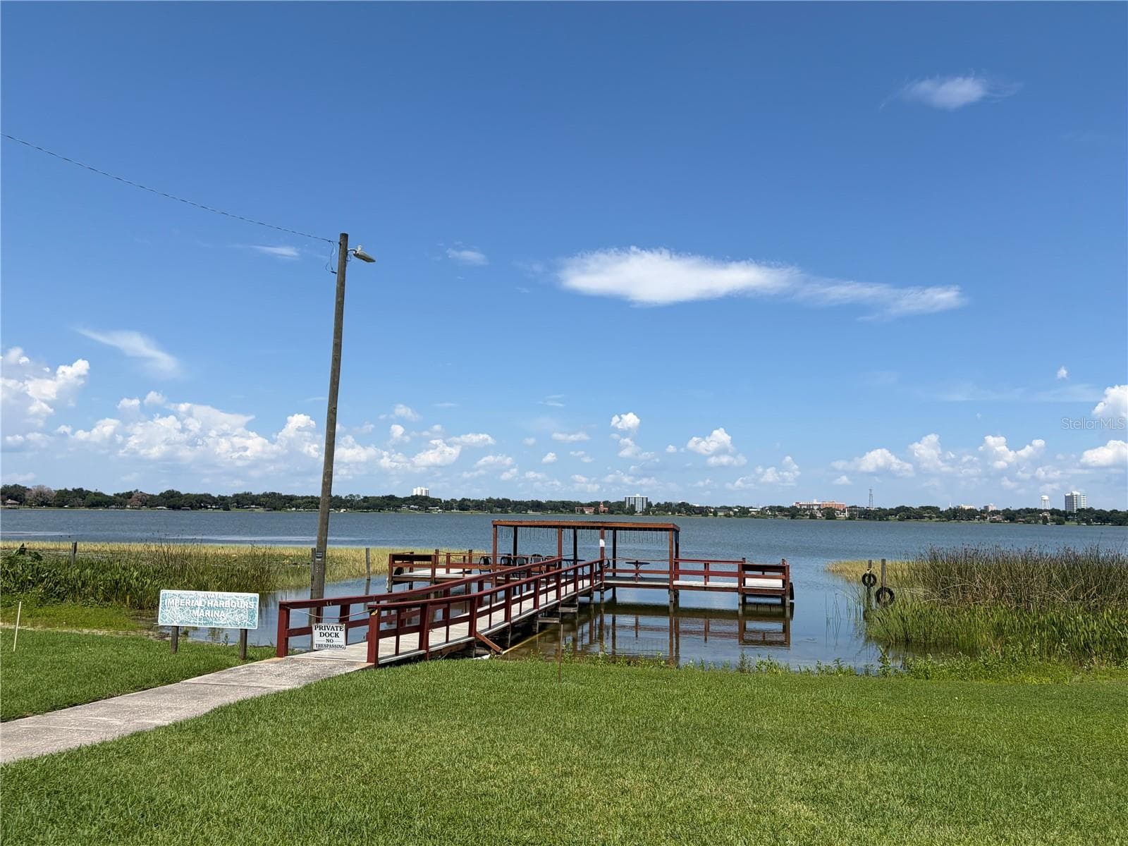 private community dock on Lake Howard - 333 LAKE HOWARD DR NW #211B, WINTER HAVEN