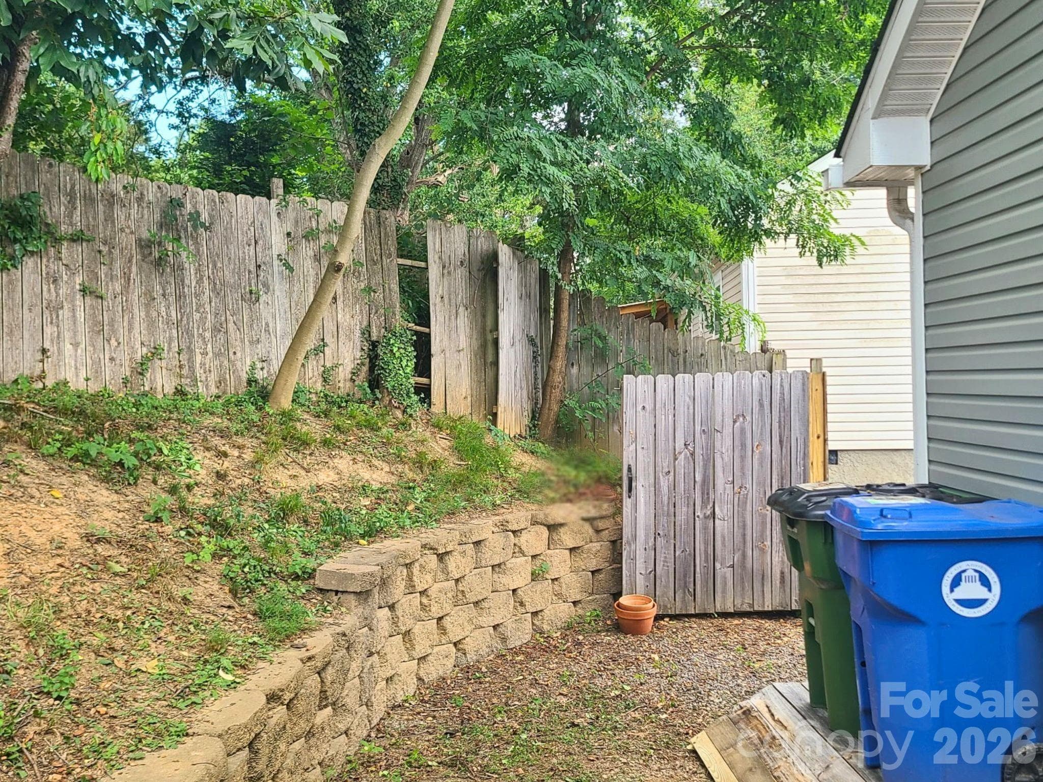 7/9/26 part of fence removed for more parking space - 253 Brooklyn Lane, Asheville