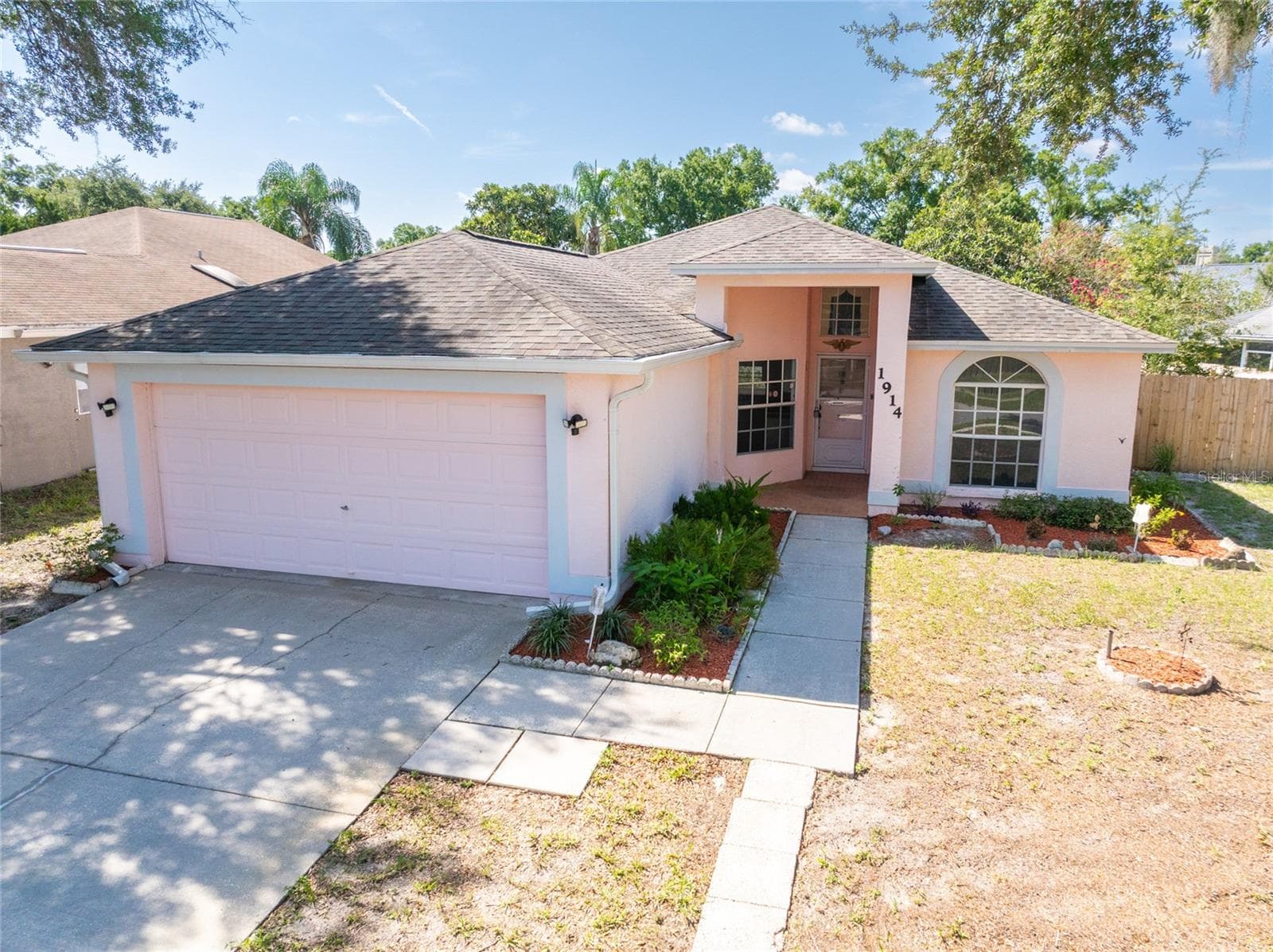 Single Family Residence at 1914 WOODCUT DR, LUTZ, photo 2 of 28