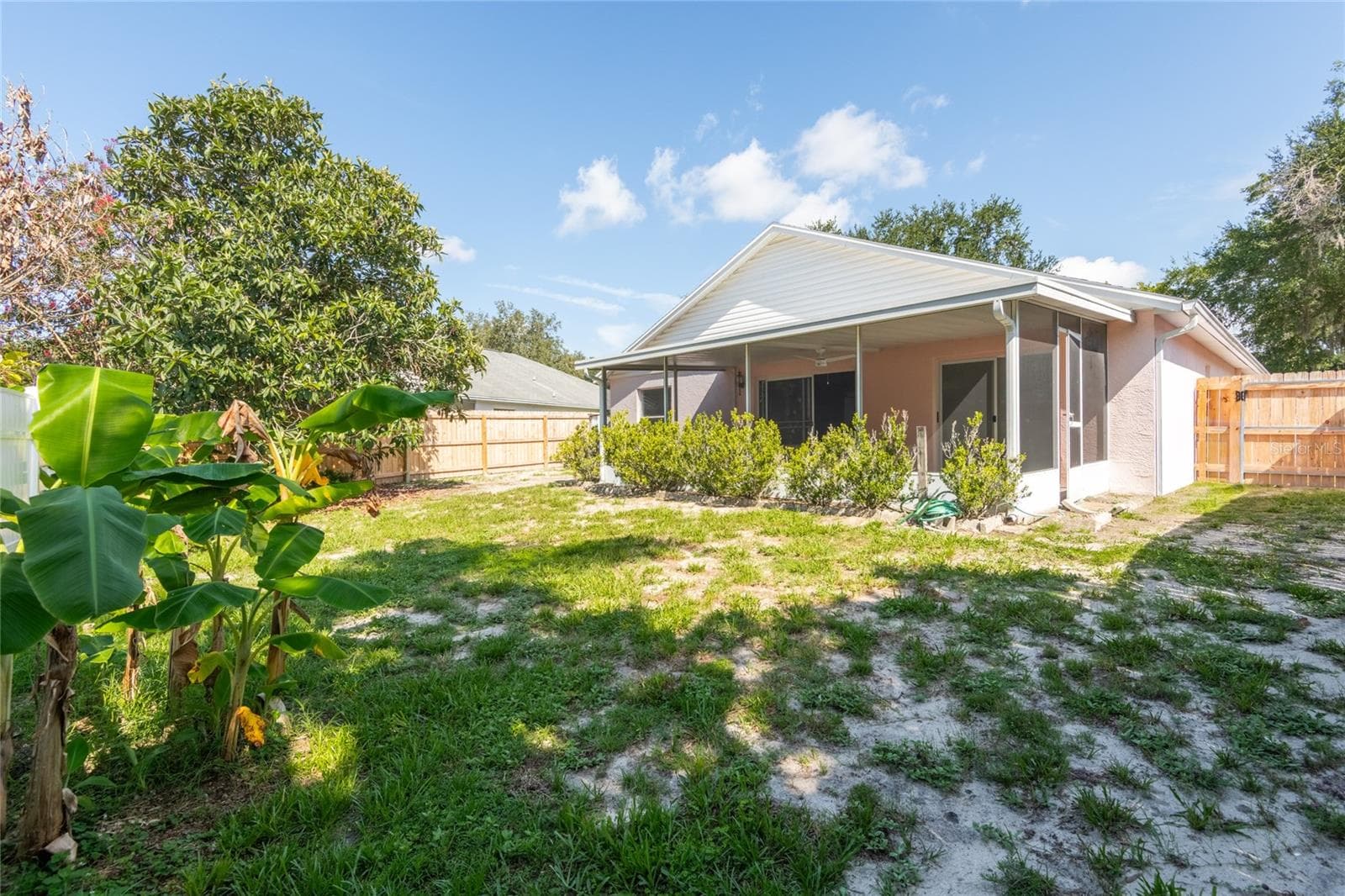 Large fenced in backyard. - 1914 WOODCUT DR, LUTZ