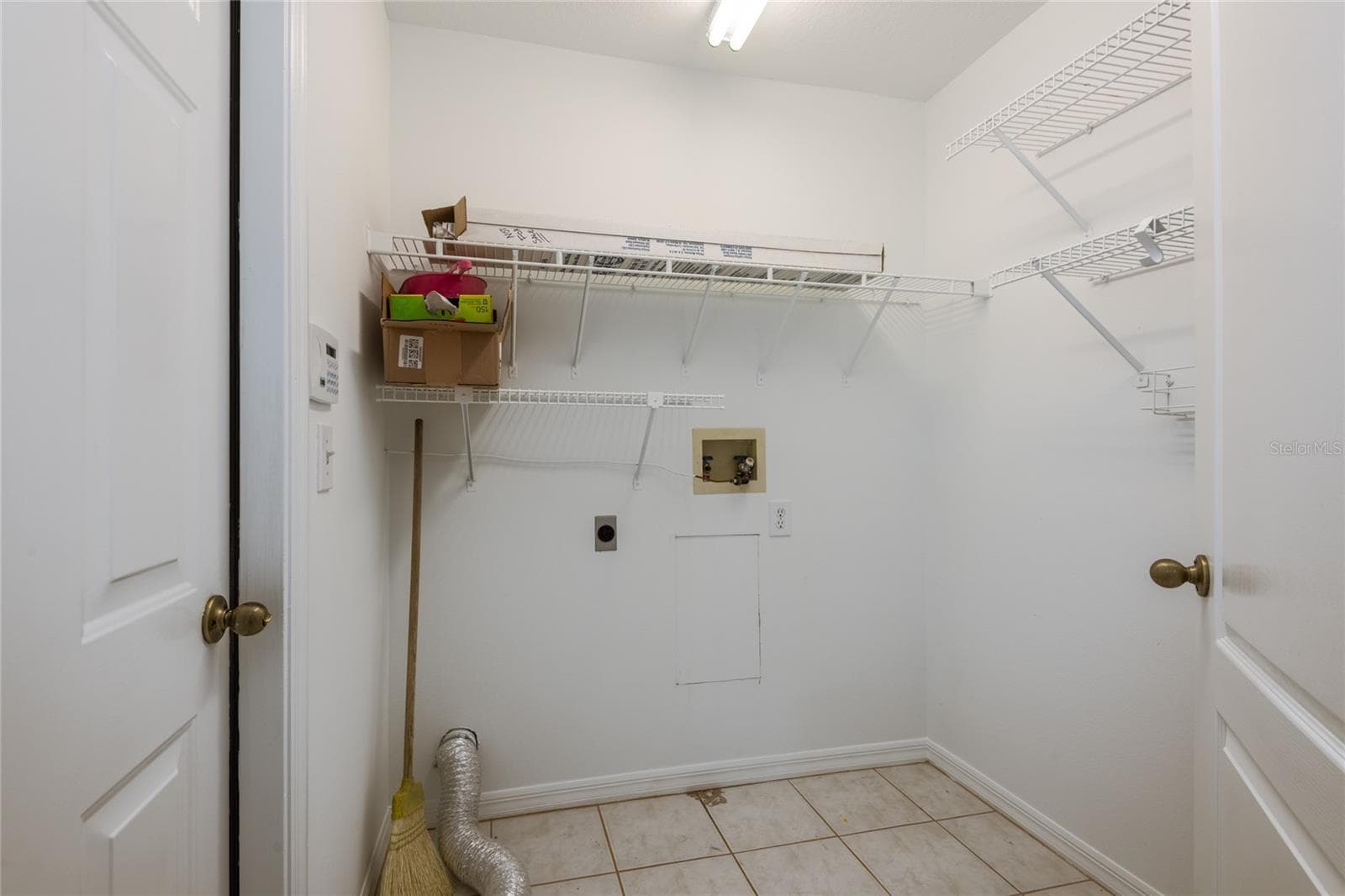 Large laundry room. - 1914 WOODCUT DR, LUTZ
