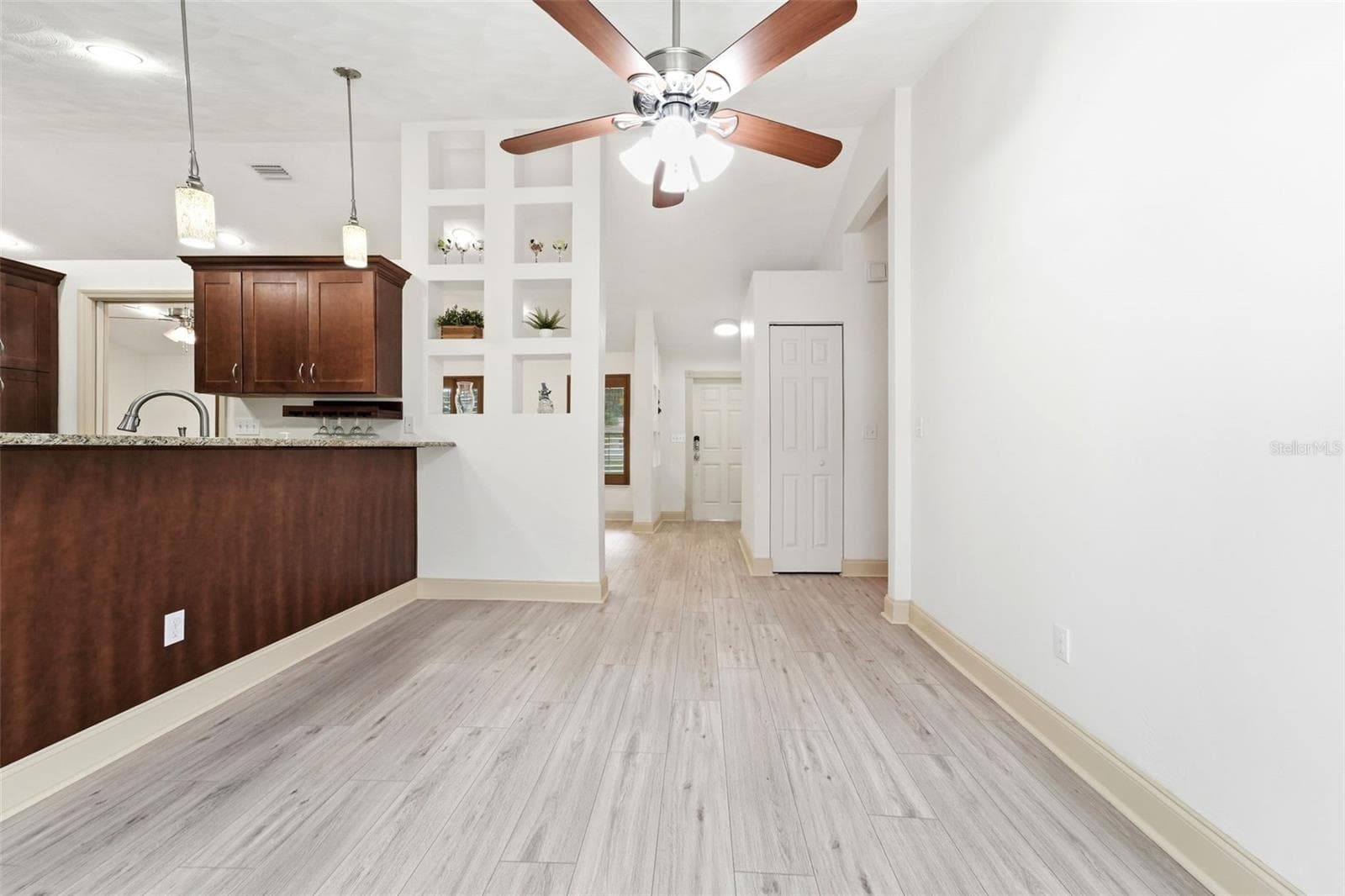 Whether you're hosting a dinner party or enjoying a quiet weeknight meal, this versatile dining space is ready to fit your lifestyle. - 59 CRESTWOOD CIR, ORMOND BEACH