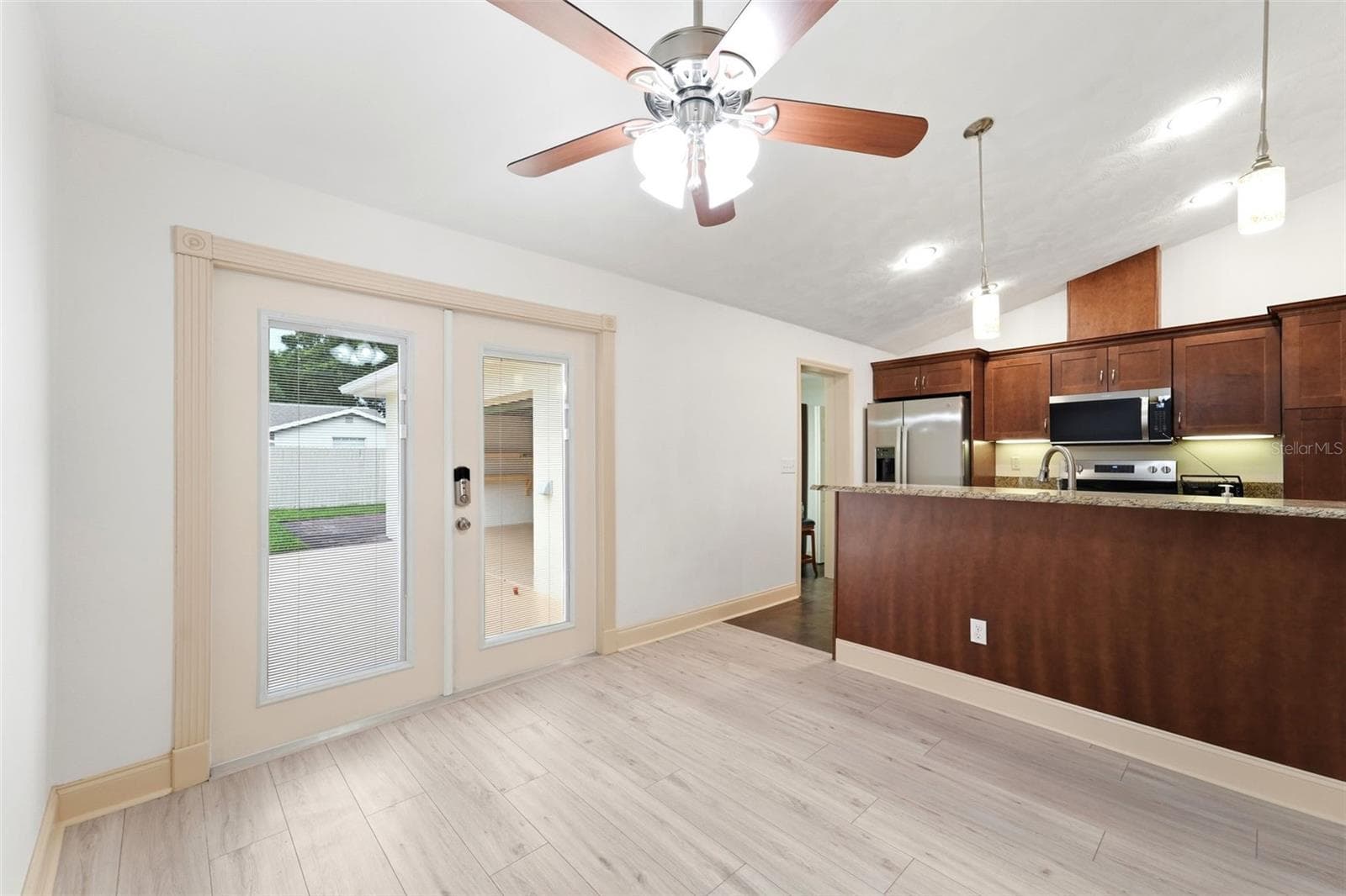 A welcoming dining space that's perfect for family dinners or holiday celebrations. - 59 CRESTWOOD CIR, ORMOND BEACH