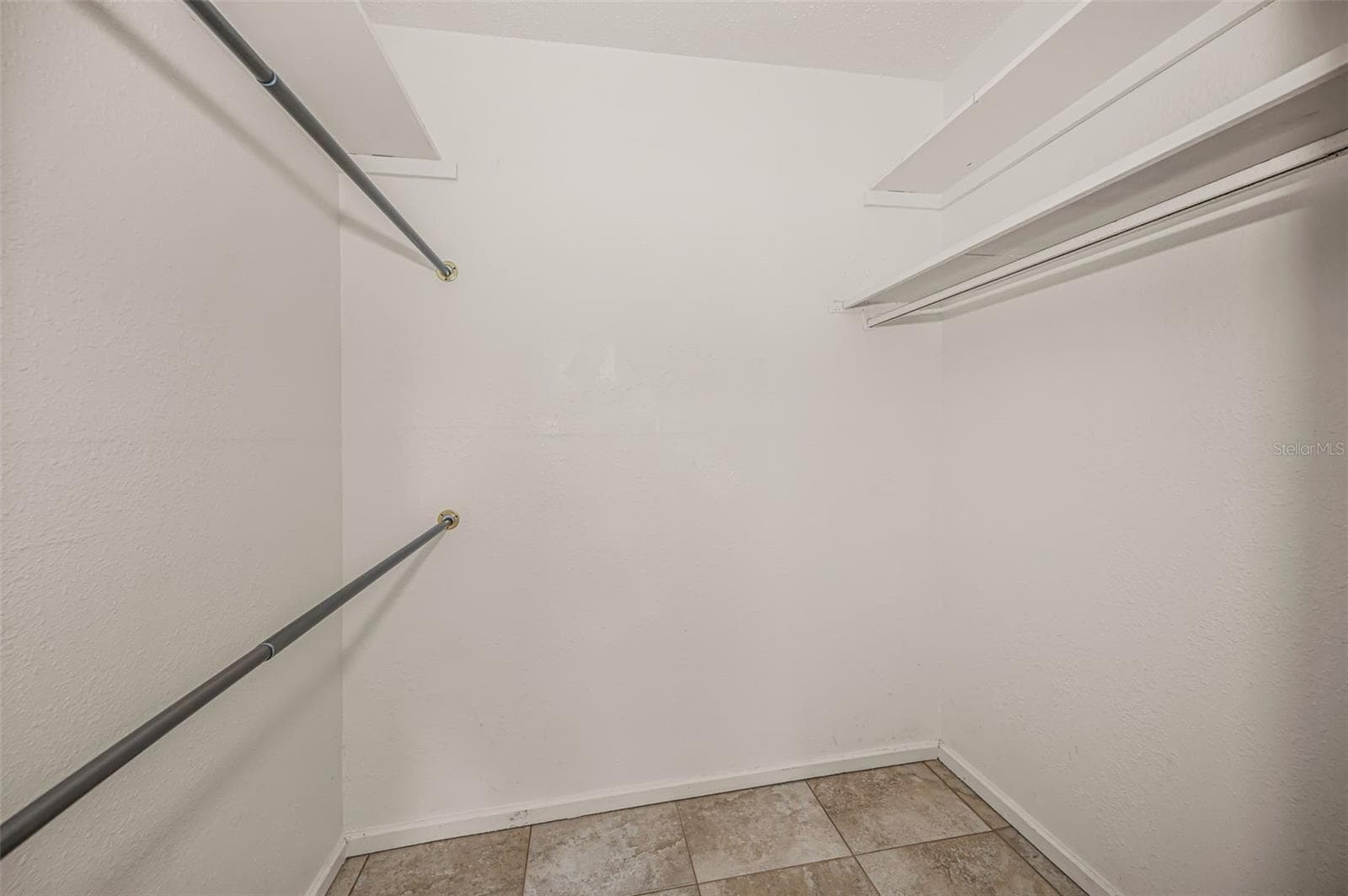 walk in closet in primary bedroom - 1960 UNION ST #5, CLEARWATER