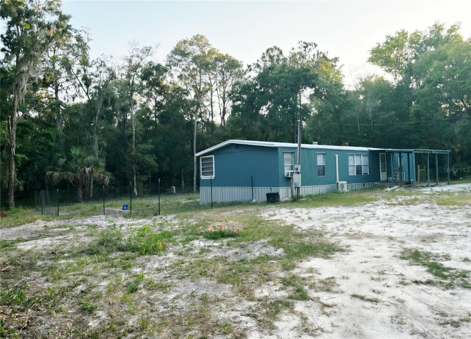 Manufactured Home at 14207 CAROLINA DOVE RD, WEEKI WACHEE, photo 2 of 12