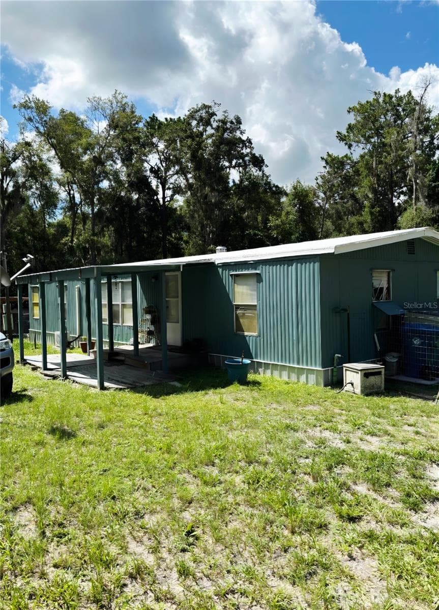 Manufactured Home at 14207 CAROLINA DOVE RD, WEEKI WACHEE, photo 3 of 12