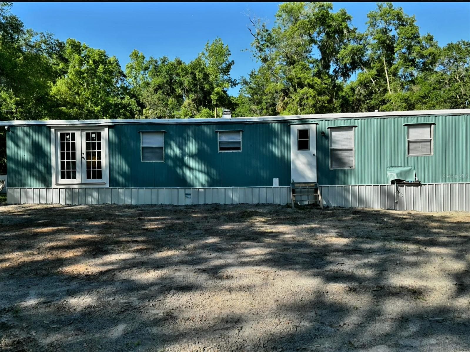 Manufactured Home at 14207 CAROLINA DOVE RD, WEEKI WACHEE, photo 4 of 12