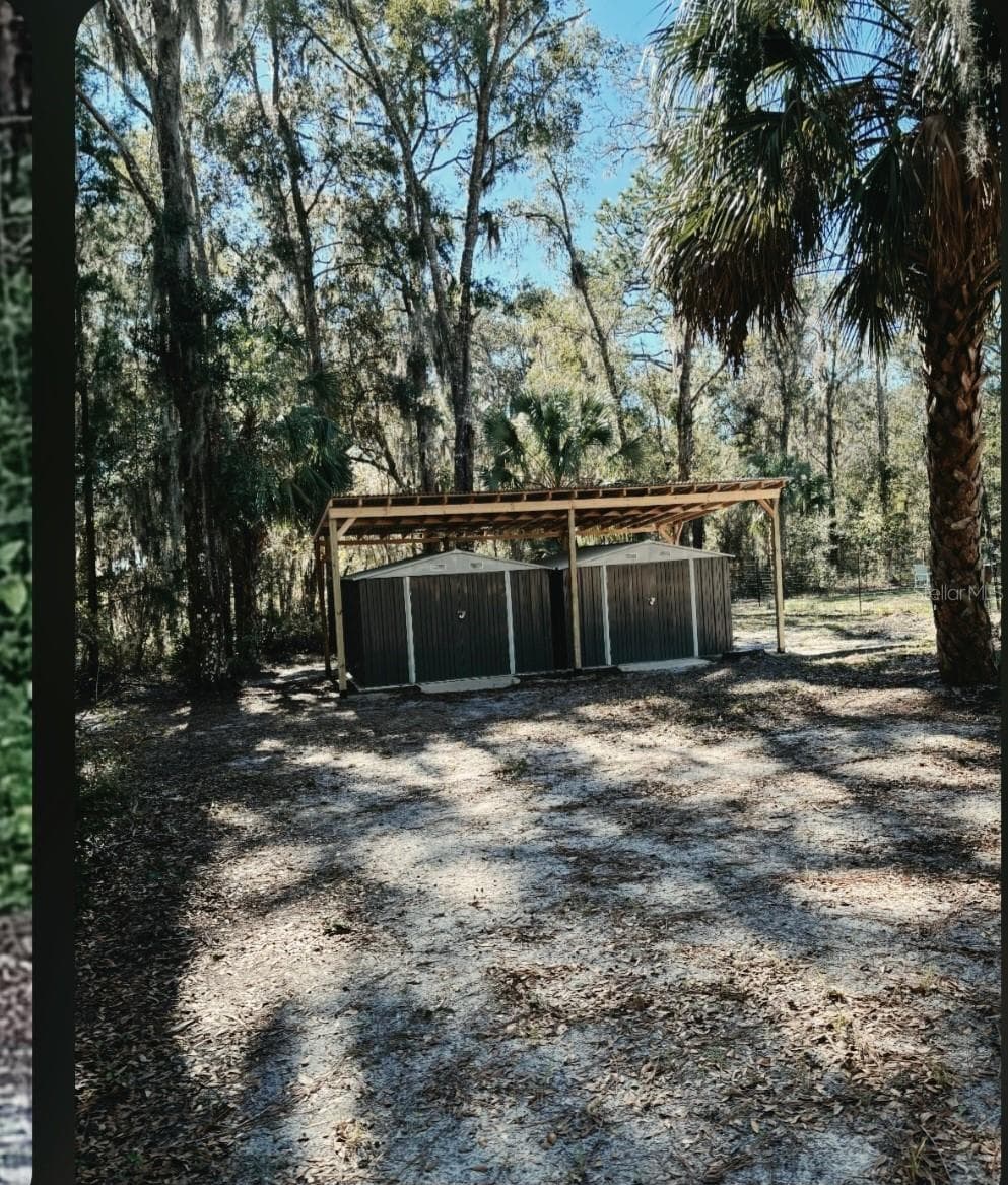 Manufactured Home at 14207 CAROLINA DOVE RD, WEEKI WACHEE, photo 6 of 12