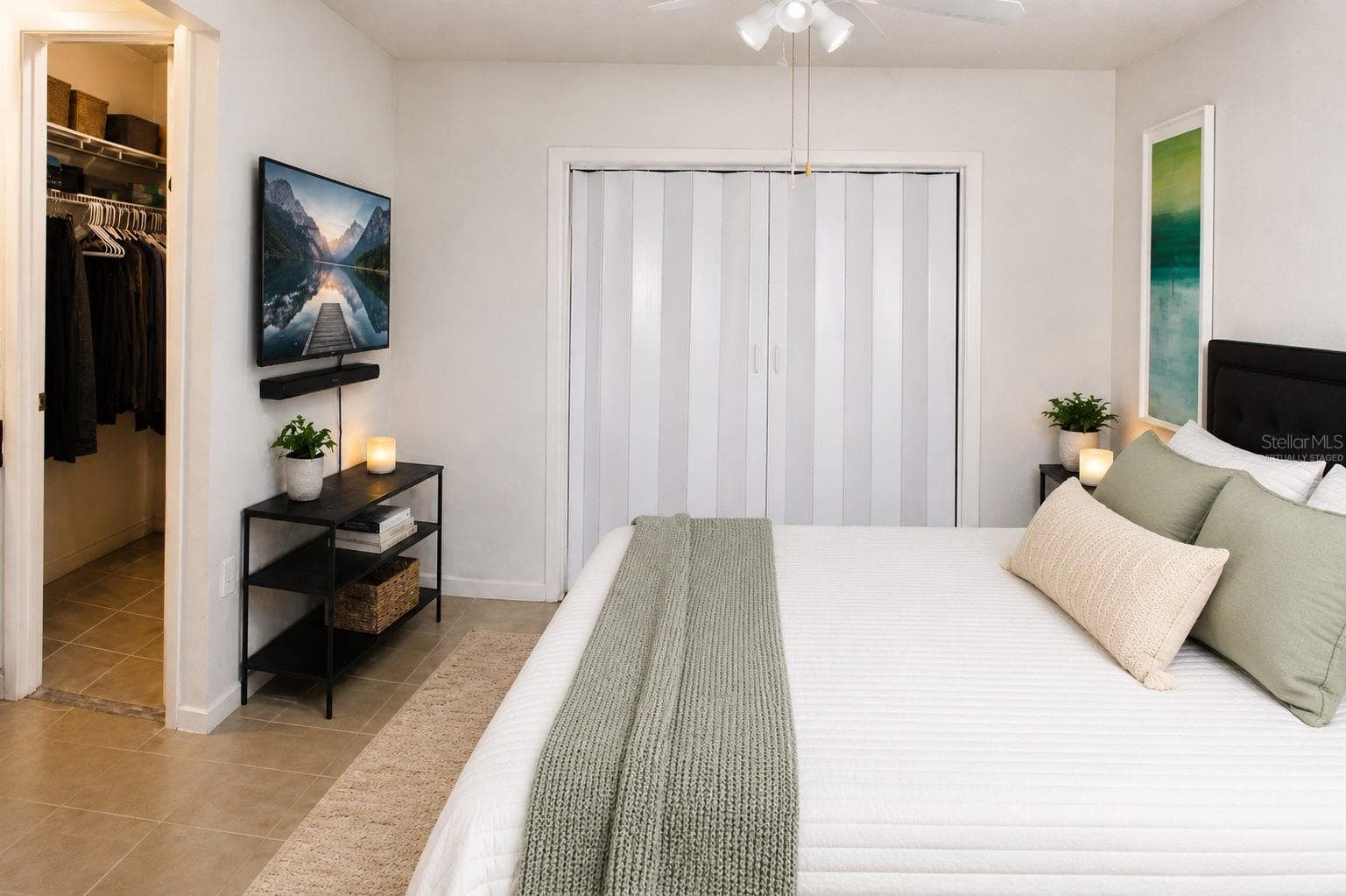 Virtually staged photo. Primary Bedroom - 2008 HOUNDSLAKE DR, WINTER PARK
