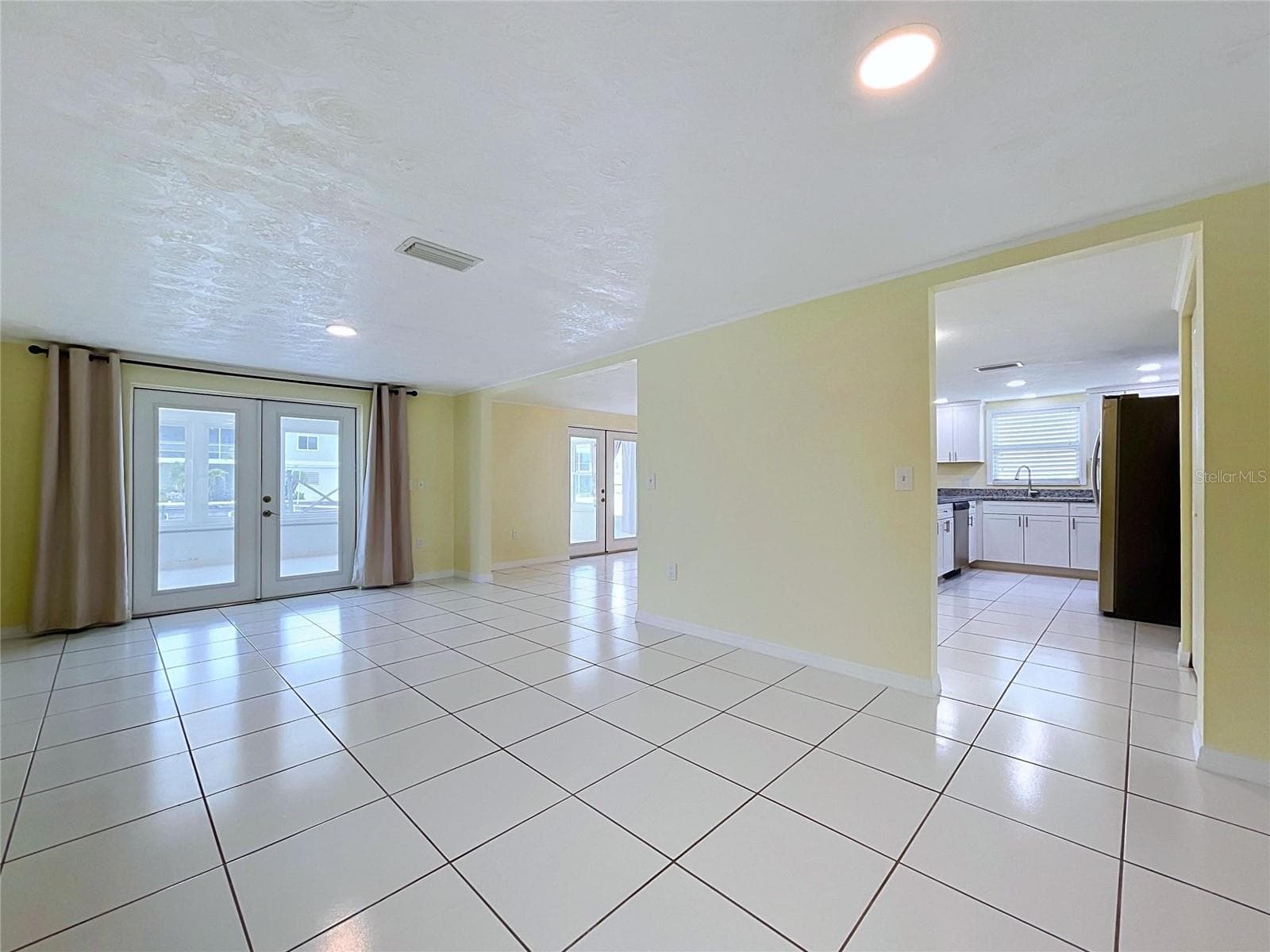 Formal Dining Room looking into kitchen - 7401 ISLANDER LN, HUDSON