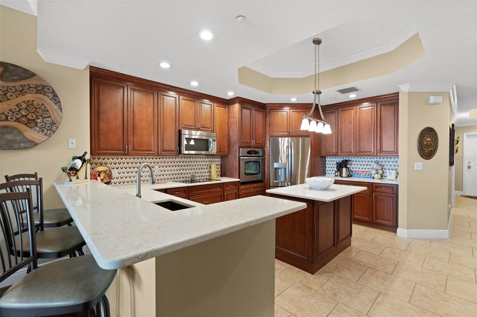 Kitchen and breakfast bar area dry bar to the right not pictured ( great desk option or wine bar) - 17717 GULF BLVD #604, REDINGTON SHORES
