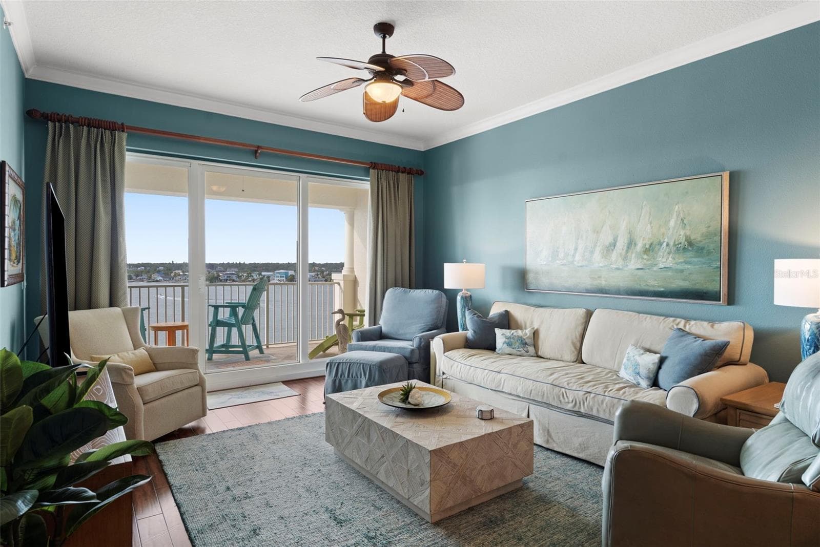 Living room with 12x8 storm hurricane grade sliders to balcony - 17717 GULF BLVD #604, REDINGTON SHORES