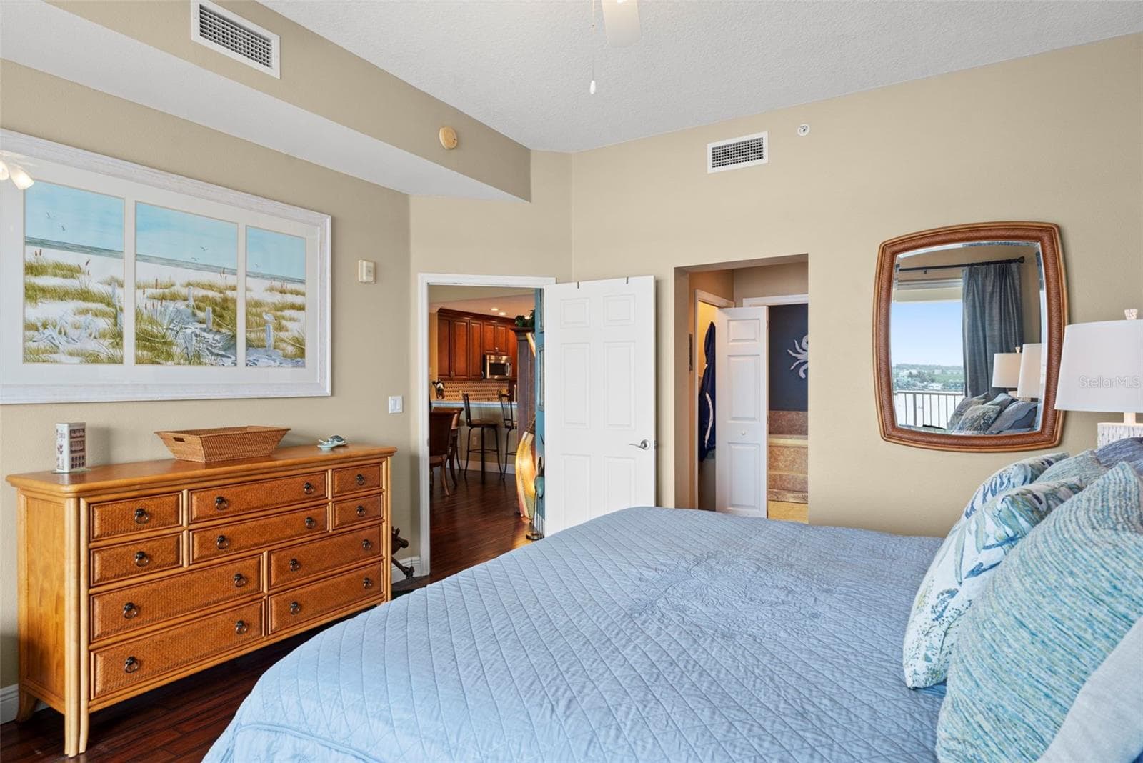 Master en-suite facing door to living room and hallway to walk in closets and primary bath - 17717 GULF BLVD #604, REDINGTON SHORES