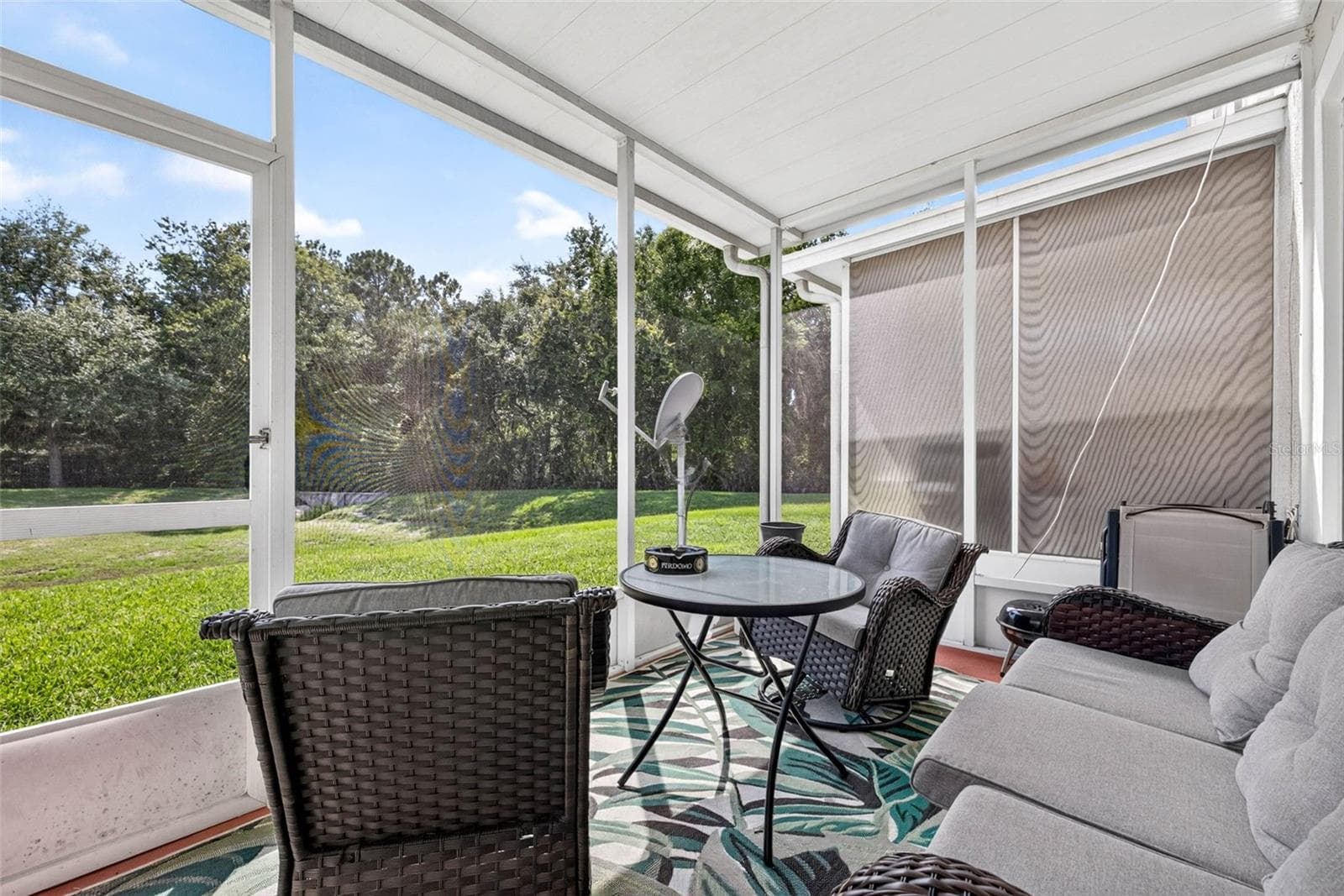 Screen enclosed porch - 26624 CHIMNEY SPIRE LN, WESLEY CHAPEL