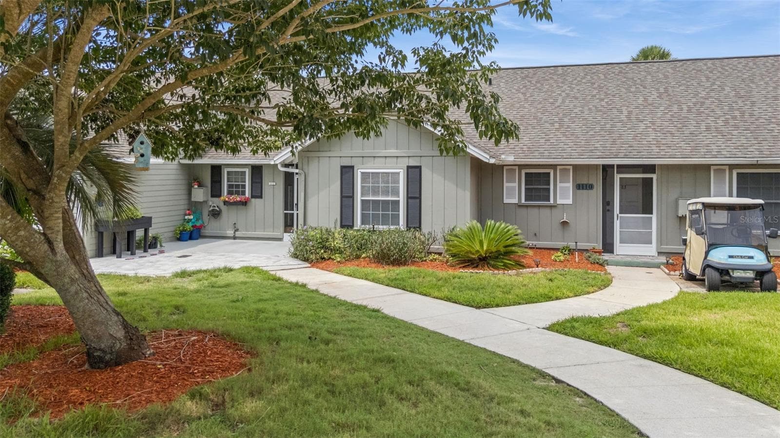 Sidewalk leading to the front entry - 1112 VILLA LN #84, APOPKA