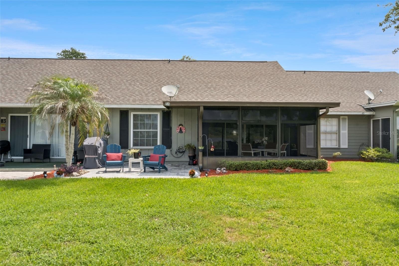 Back with extended pavers for relaxing and grilling. - 1112 VILLA LN #84, APOPKA