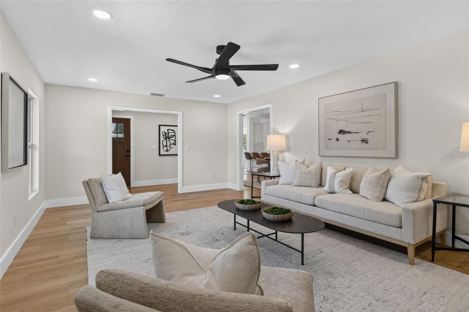 View of living room to the entrance hallway - 310 PARK ST N, ST PETERSBURG