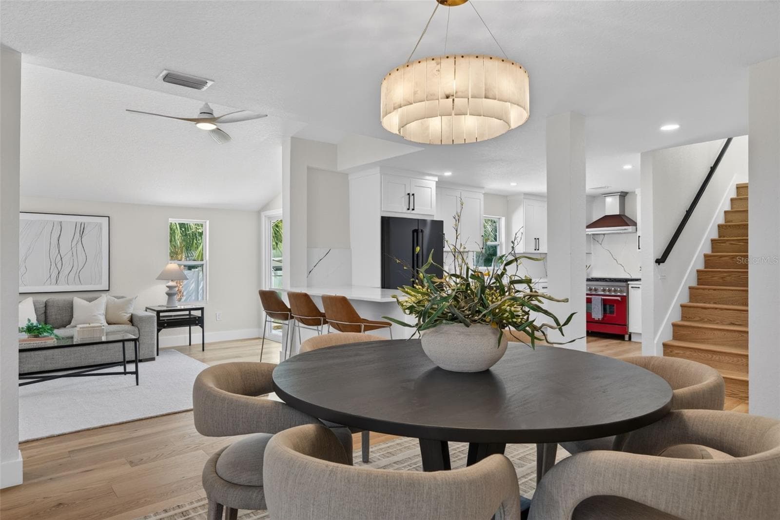 Large dedicated dining room with view to kitchen and family room - 310 PARK ST N, ST PETERSBURG