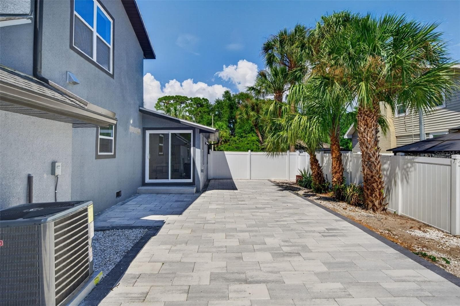 View of paver patio looking towards the family room - 310 PARK ST N, ST PETERSBURG