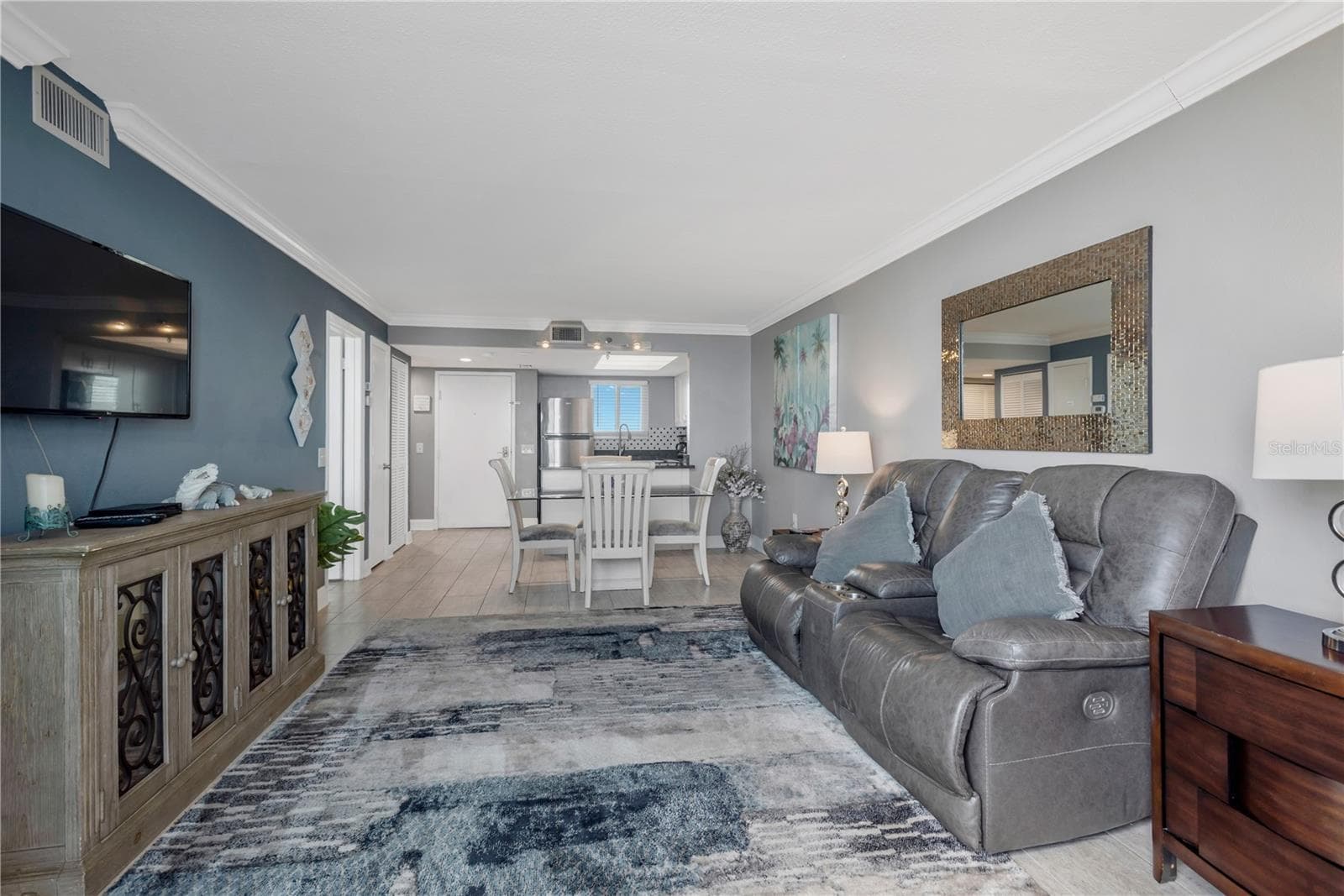 A different perspective on Living to dining to kitchen. - 5915 SEA RANCH DR #503, HUDSON