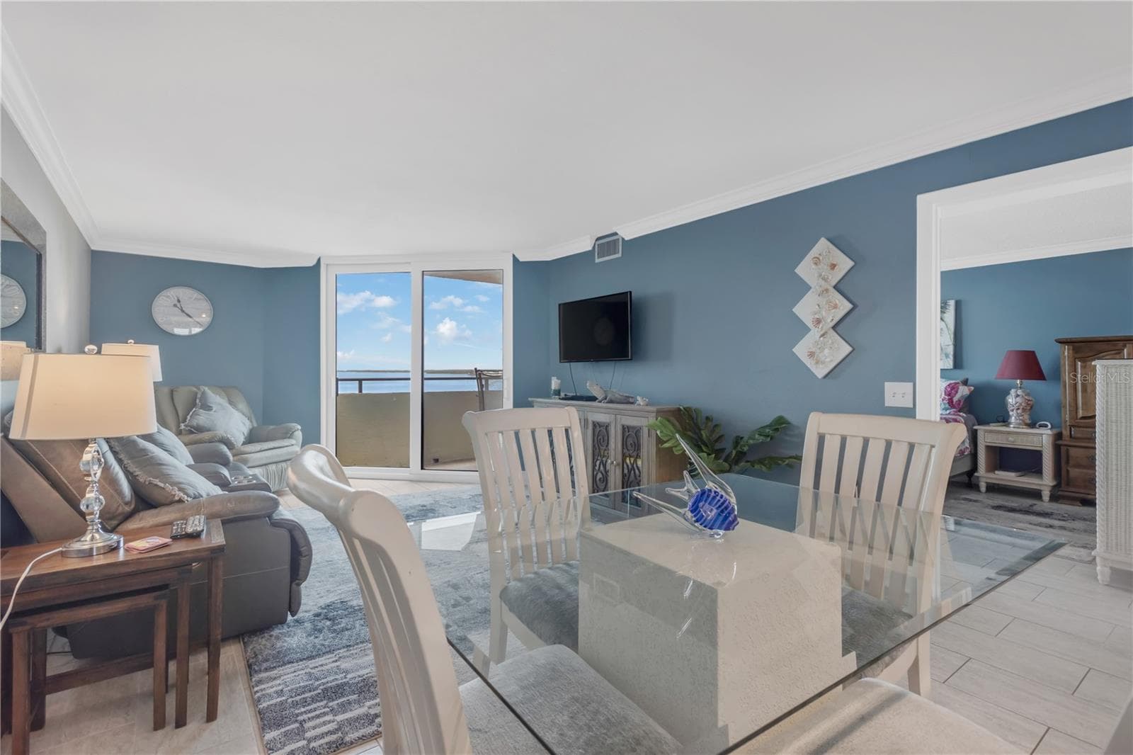 Living Room / Dining Area and entrance to Master Bedroom on right. - 5915 SEA RANCH DR #503, HUDSON