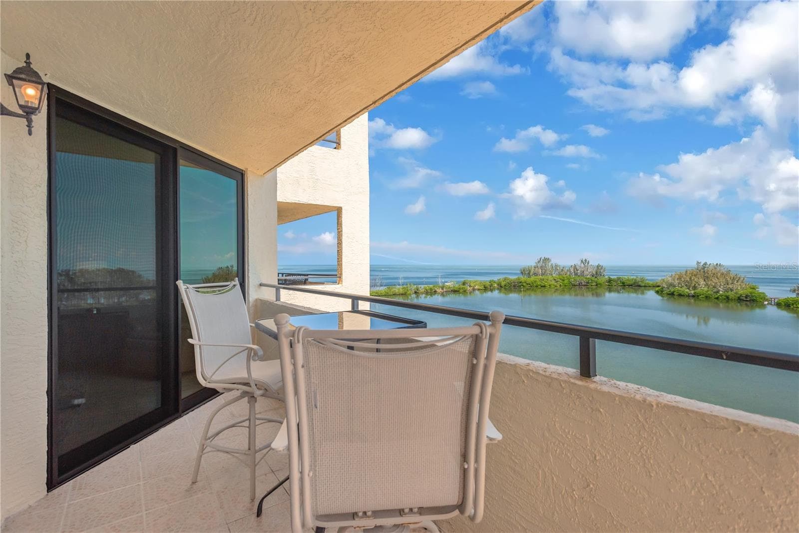 Enjoy perfect Lagoon and Gulf of America views from your private covered balcony and enjoy the spectacular watercolor sunsets at end of day. - 5915 SEA RANCH DR #503, HUDSON