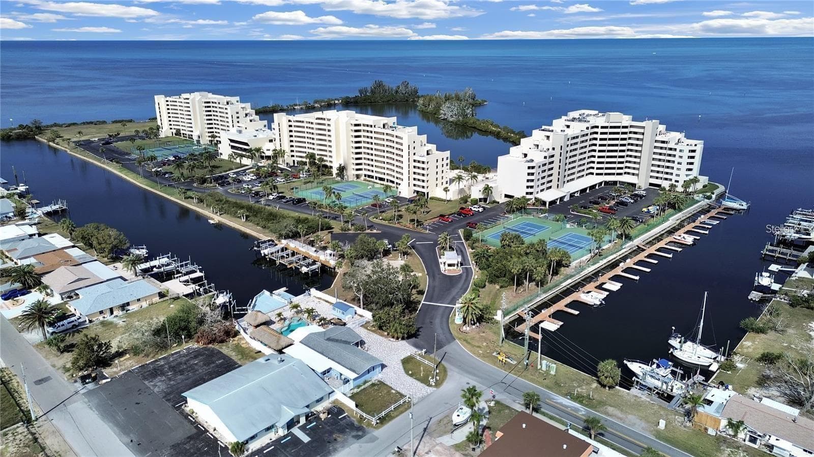 Aerial view of Gulf Island Beach & Tennis ~ a hidden coastal gem in Hudson Florida.  Come live the coastal lifestyle and enjoy the vibe. - 5915 SEA RANCH DR #503, HUDSON