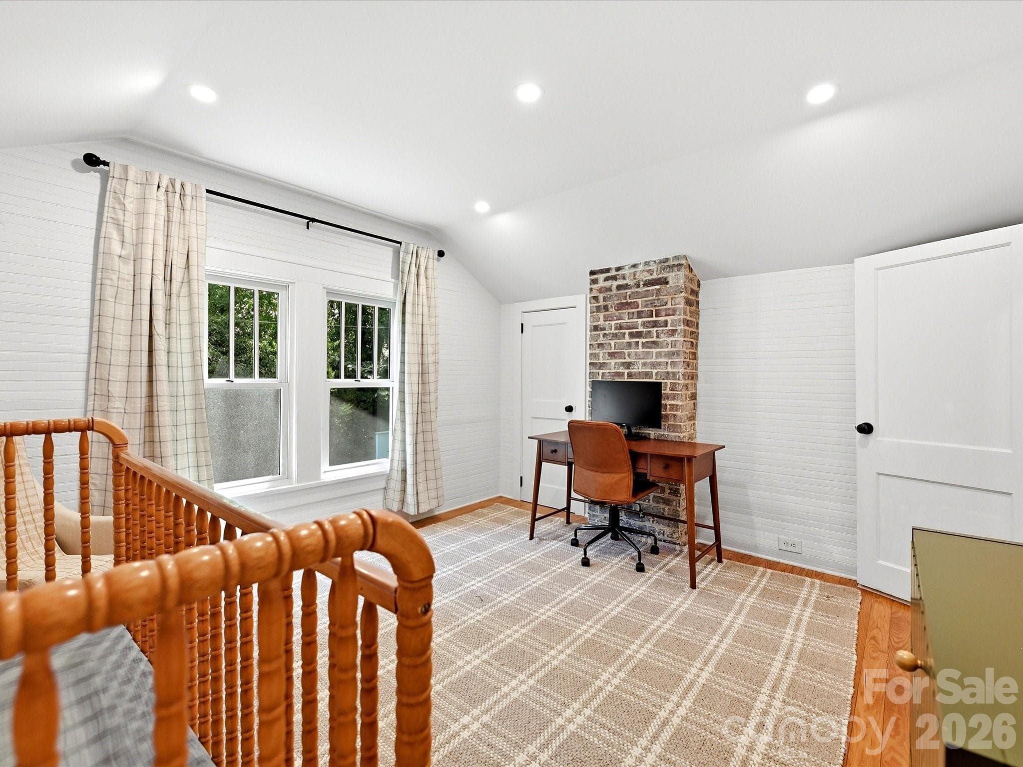 Offering exceptional flexibility, this oversized bedroom provides the perfect space for a nursery, home office, guest suite, or additional living area. - 3514 Kelly Road, Charlotte