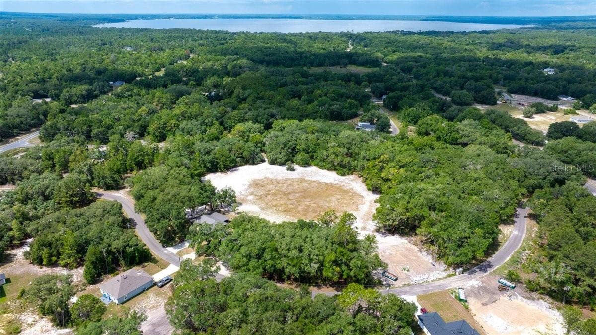 left of empty lot - FISHER LANE CT, OCKLAWAHA