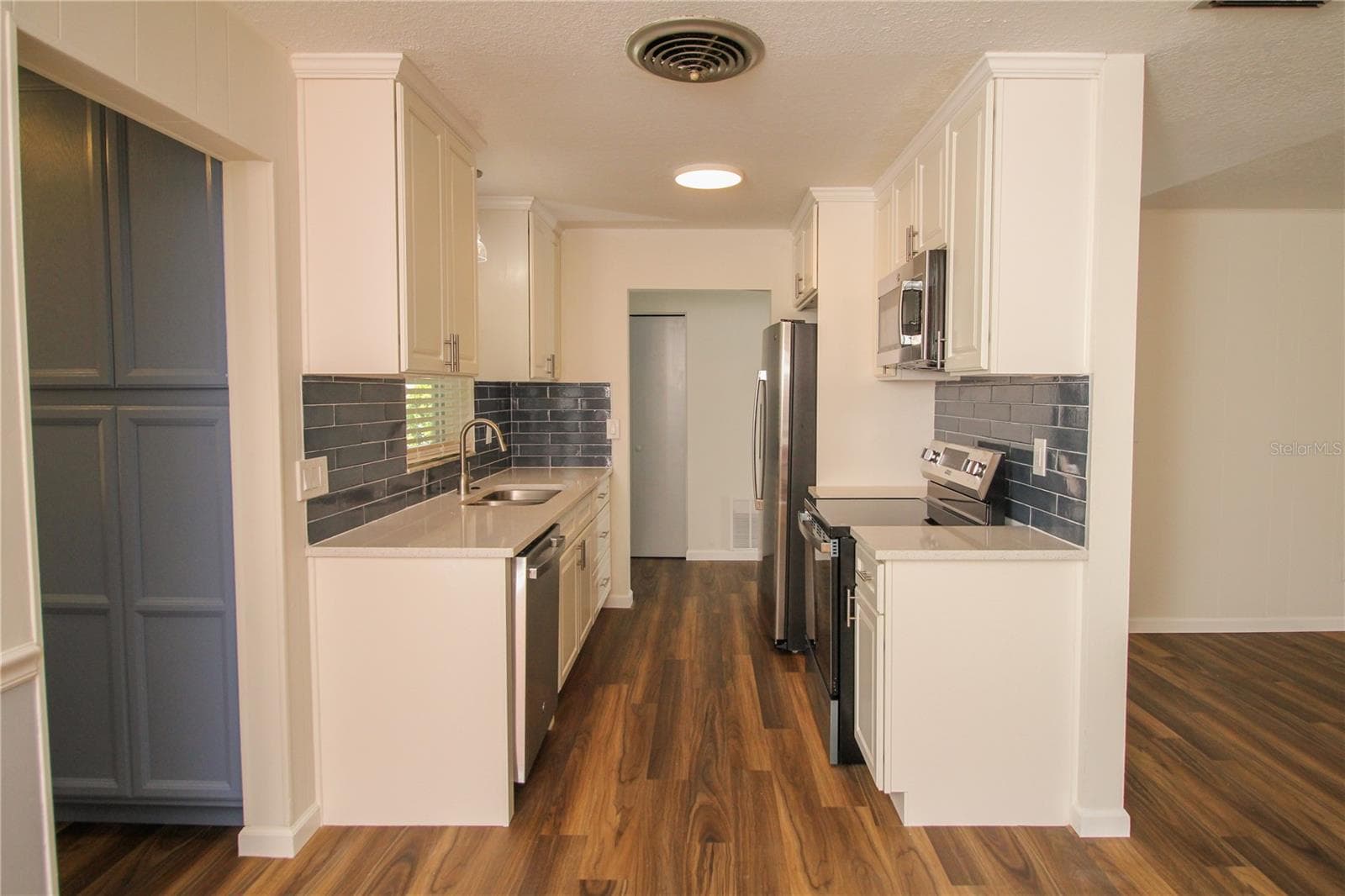 New galley kitchen - 3019 TAMPICO DR, ORLANDO