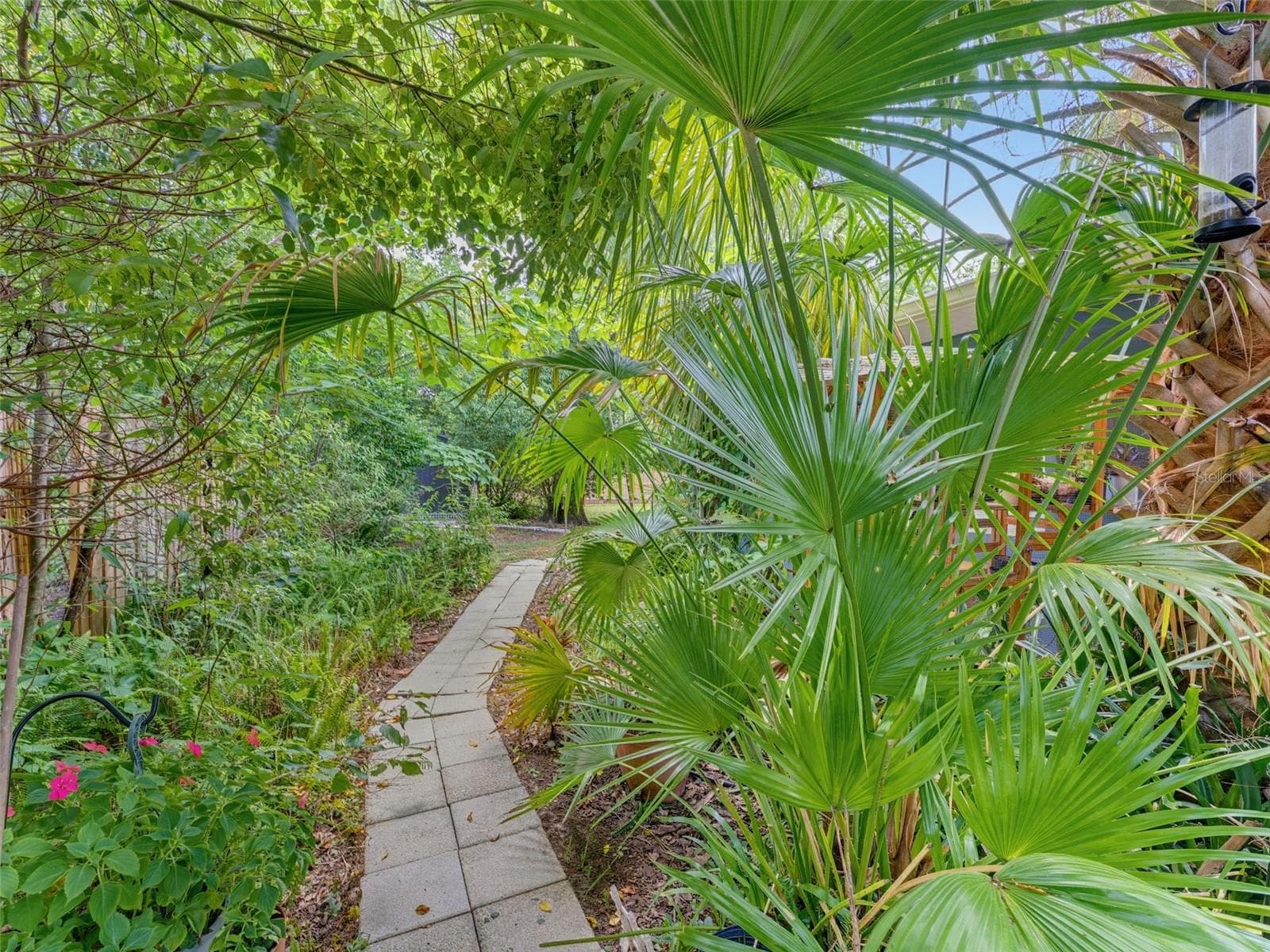 Walkway from side patio to backyard. - 5704 13TH ST, ZEPHYRHILLS