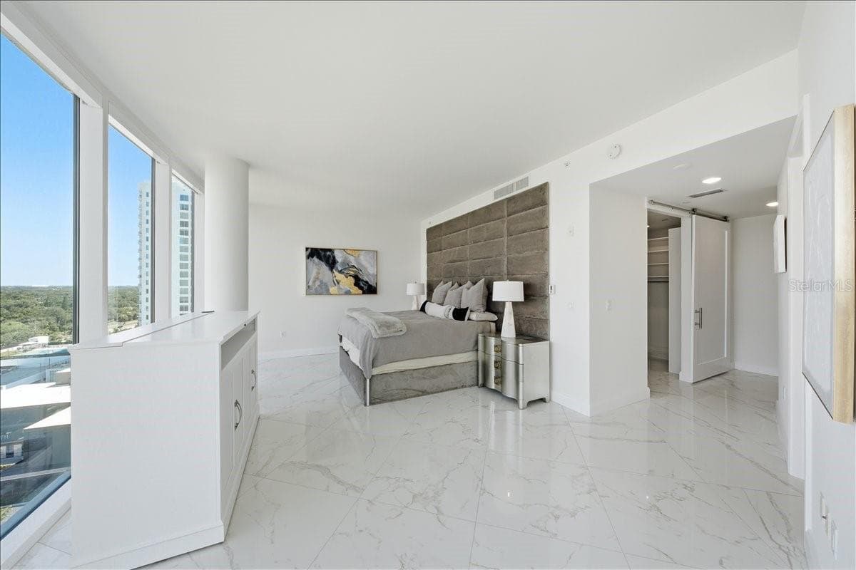 Floor-to-ceiling glass and balcony access. - 2900 W BAY TO BAY BLVD #1401, TAMPA