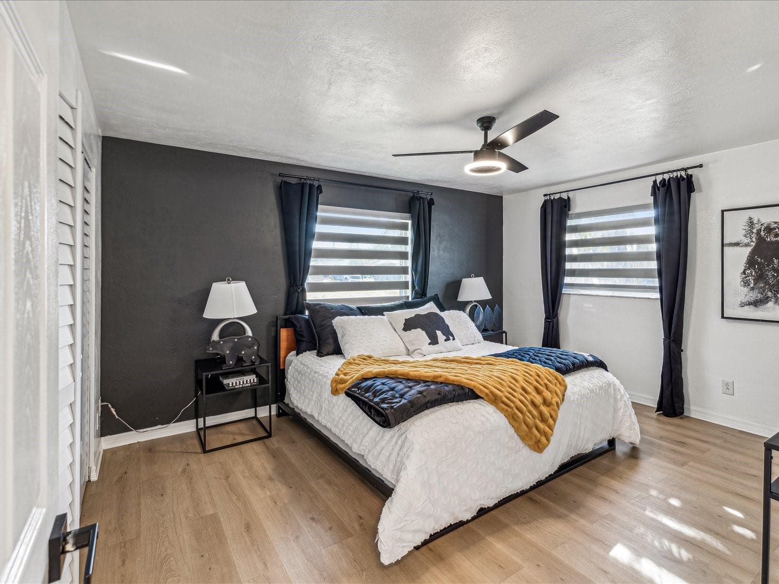 Large primary bedroom with spacious built-in closet. - 2000 57TH ST N, ST PETERSBURG
